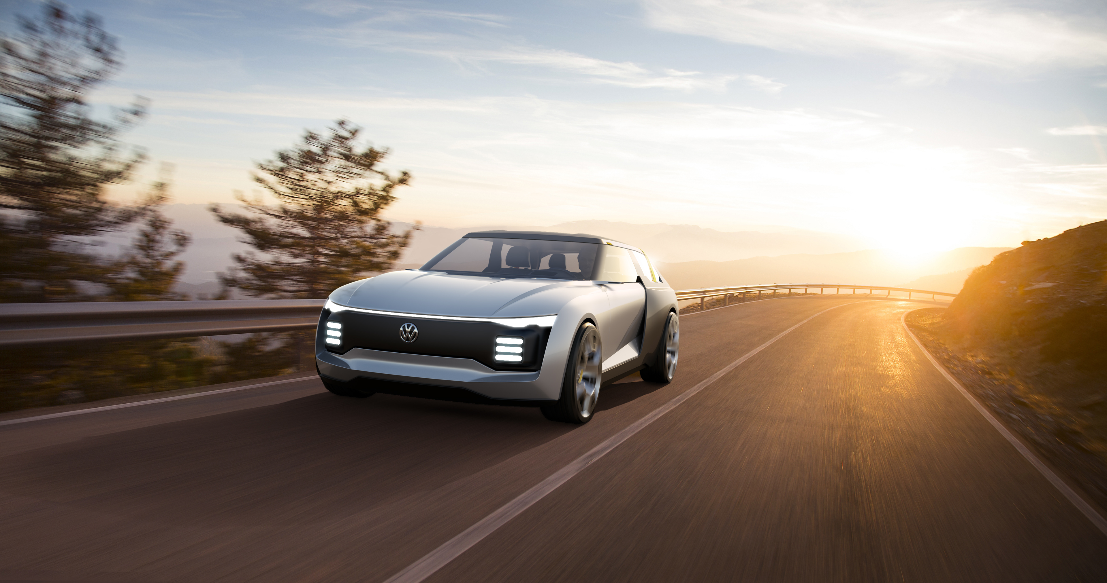 Volkswagen electric concept car on a mountain road HD Wallpaper