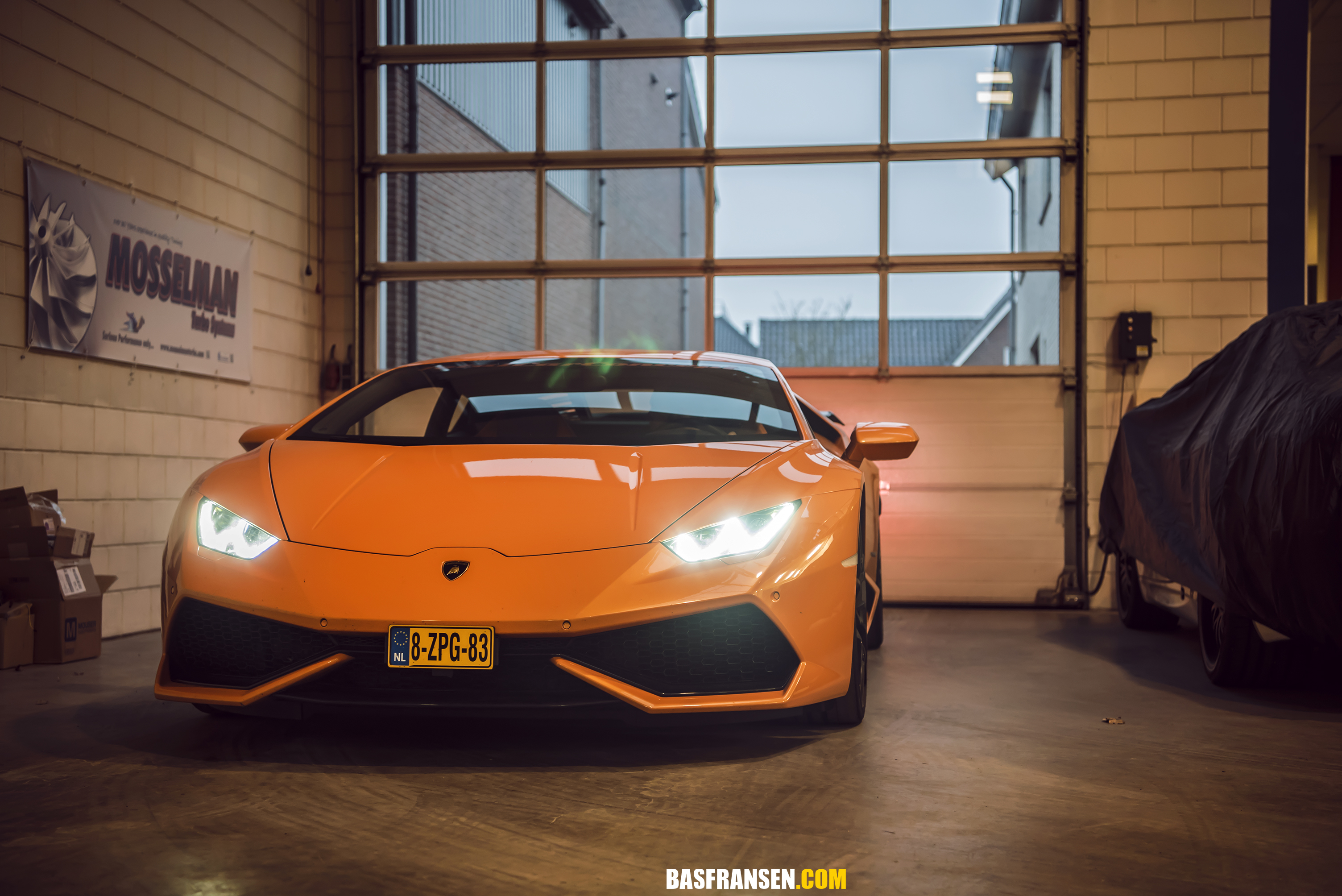 Orange Lamborghini Huracan LP 610-4 in garage HD Wallpaper