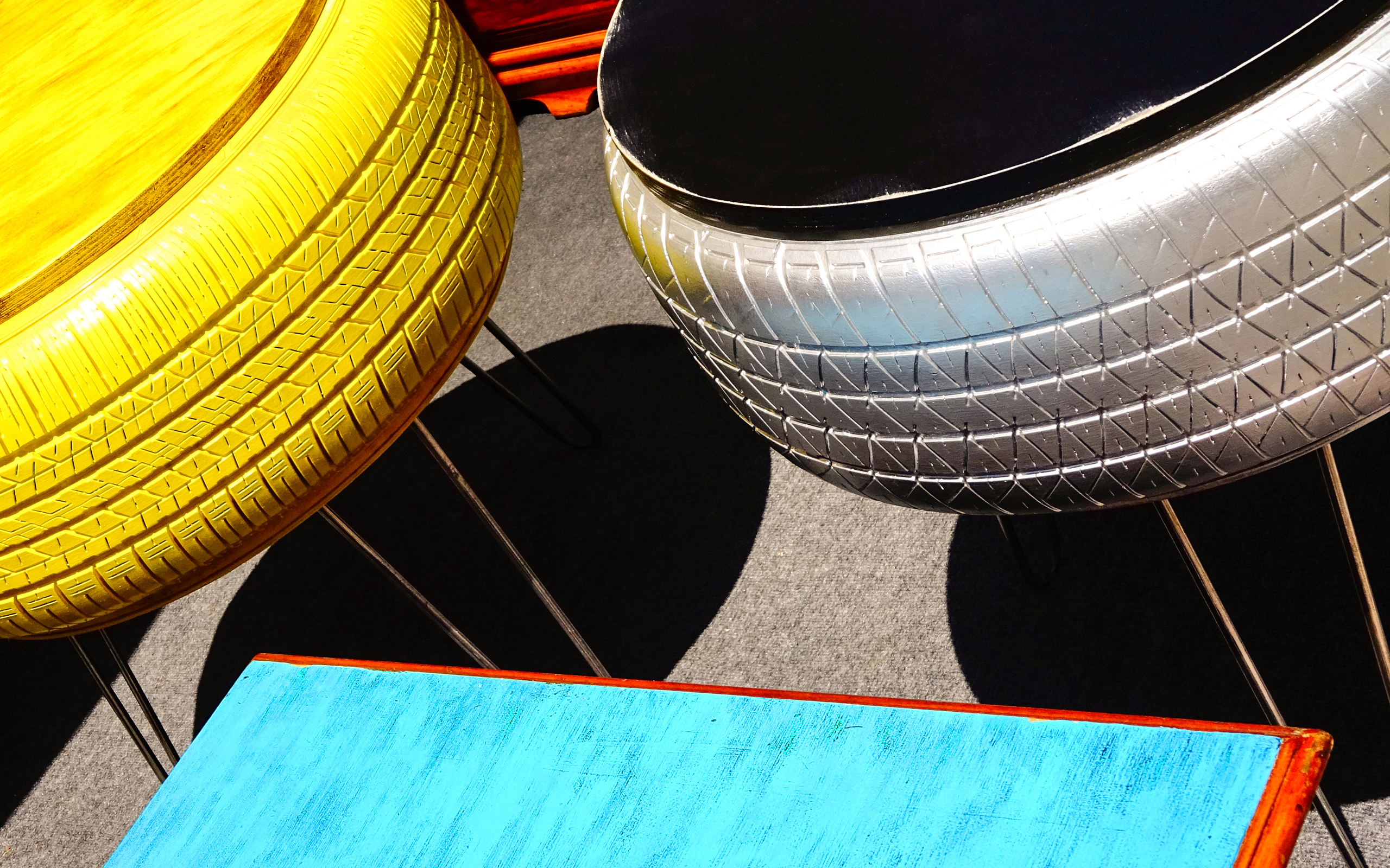 Colorful tires repurposed as furniture HD Wallpaper