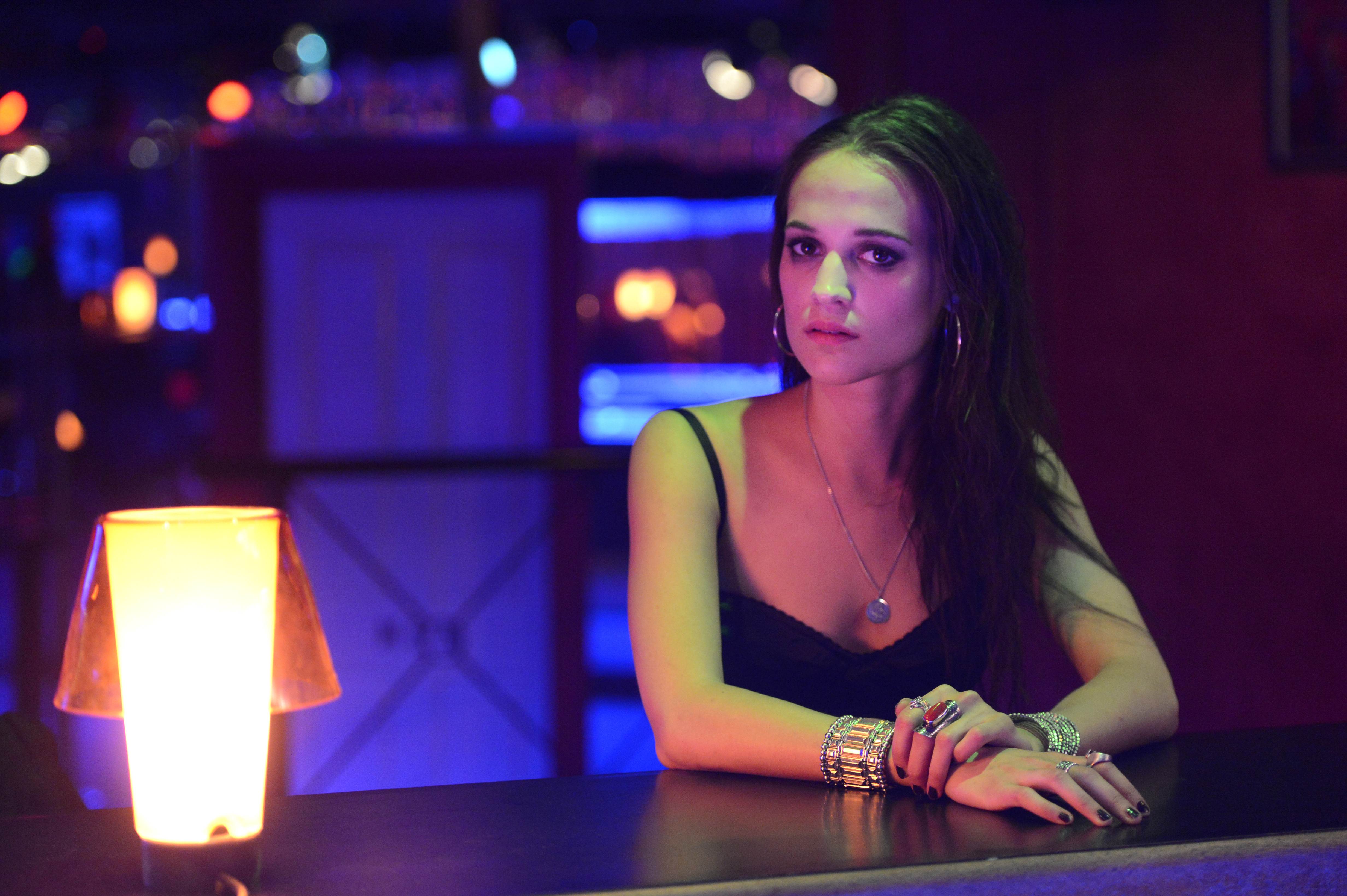 Alicia Vikander in a dimly lit bar HD Wallpaper