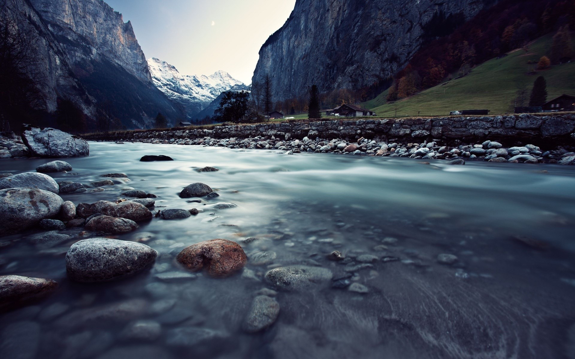 River flowing through a valley with mountains HD Wallpaper