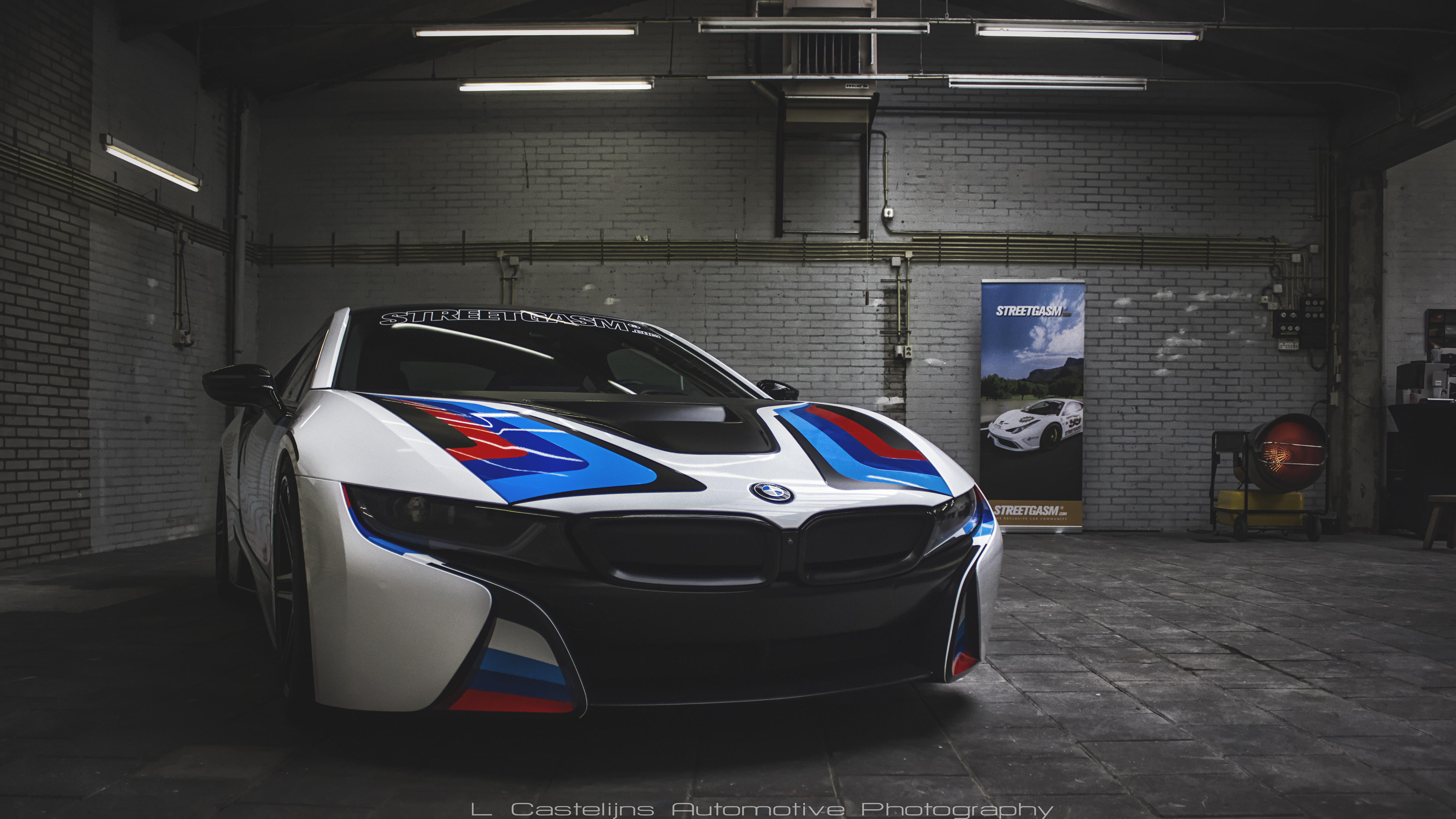 BMW i8 with M stripes in a garage HD Wallpaper