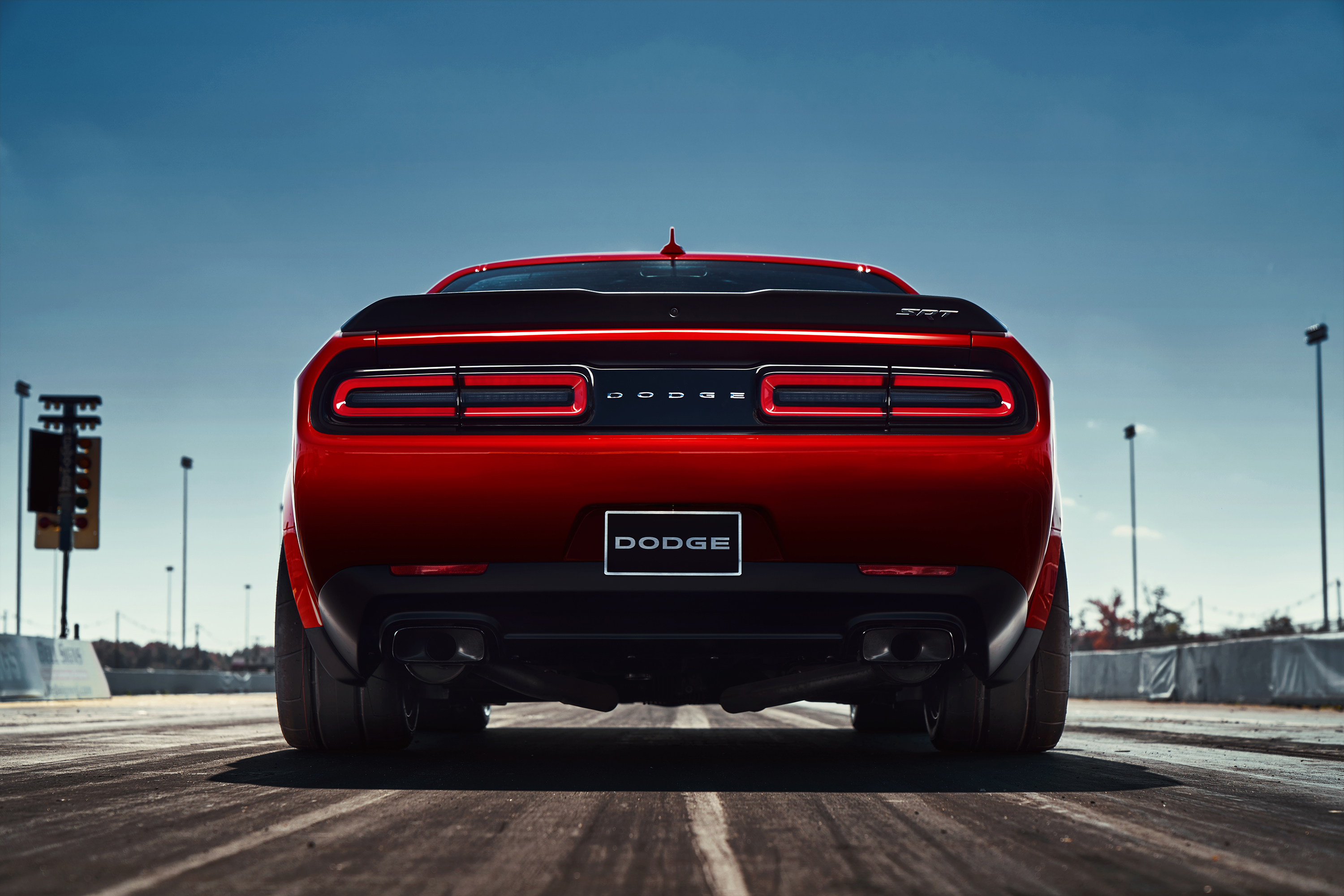 Red Dodge Challenger SRT Demon on a Racetrack HD Wallpaper