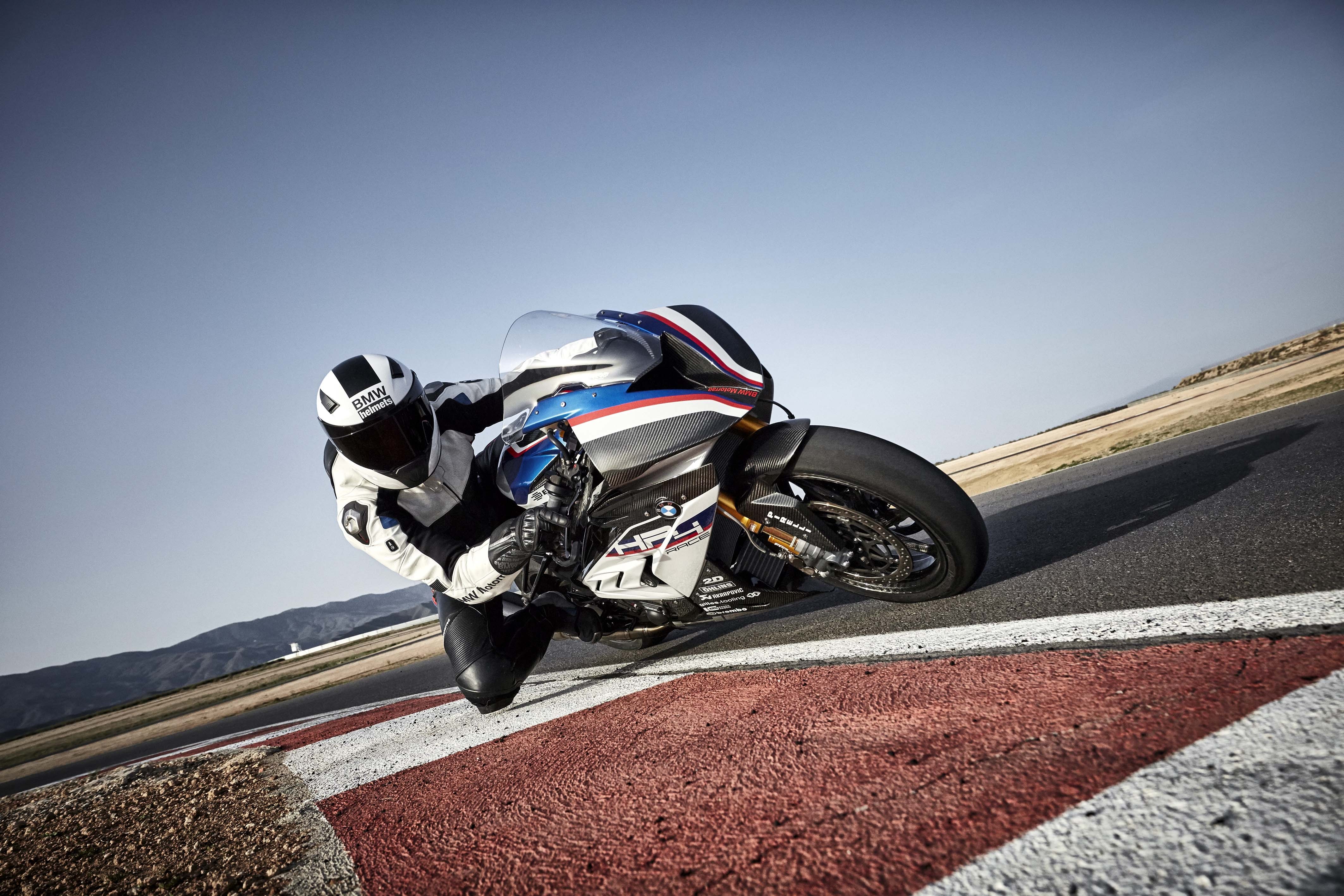 BMW HP4 Race motorcycle on a track HD Wallpaper