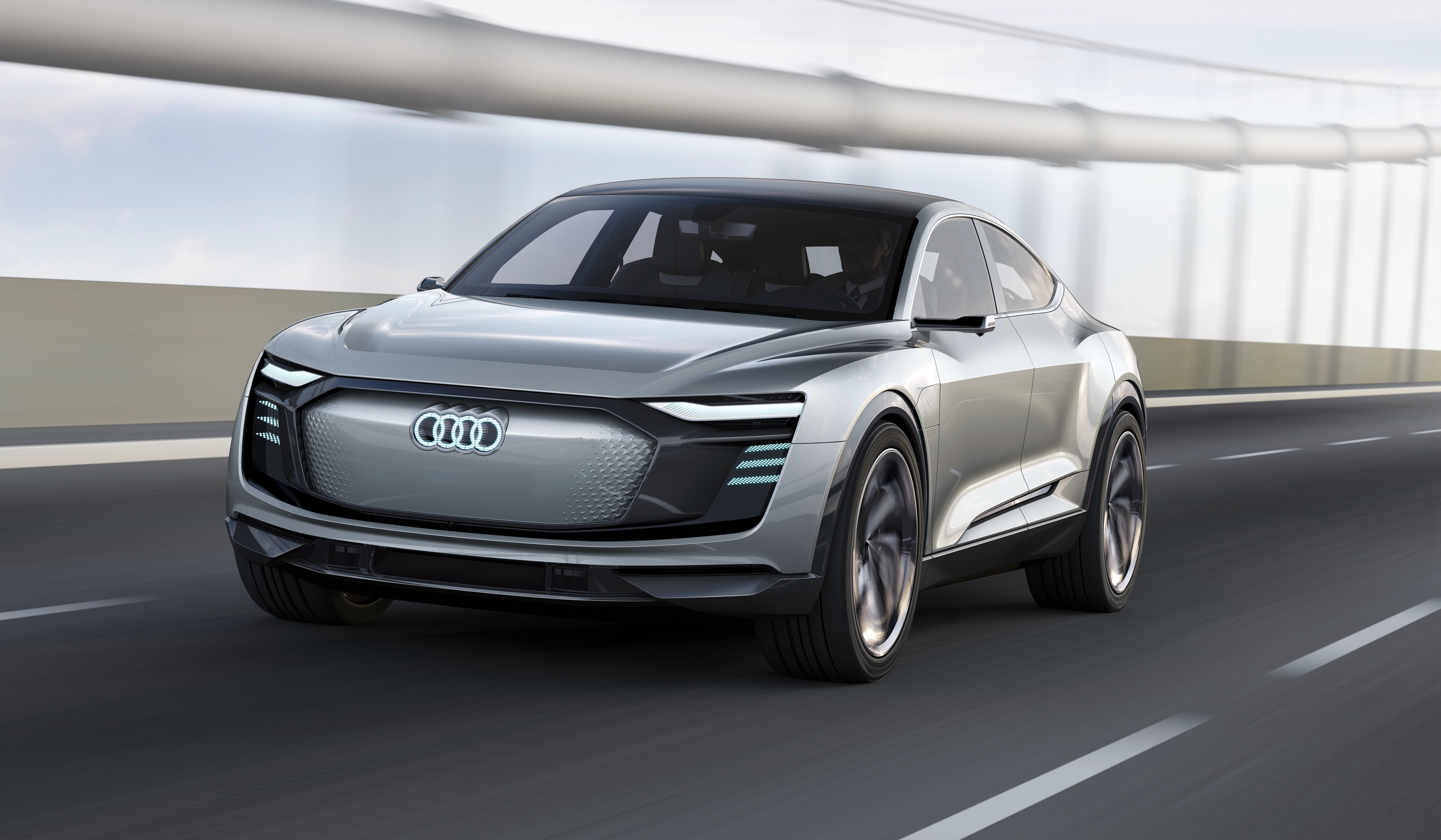 Audi E-tron Sportback concept car on a road HD Wallpaper