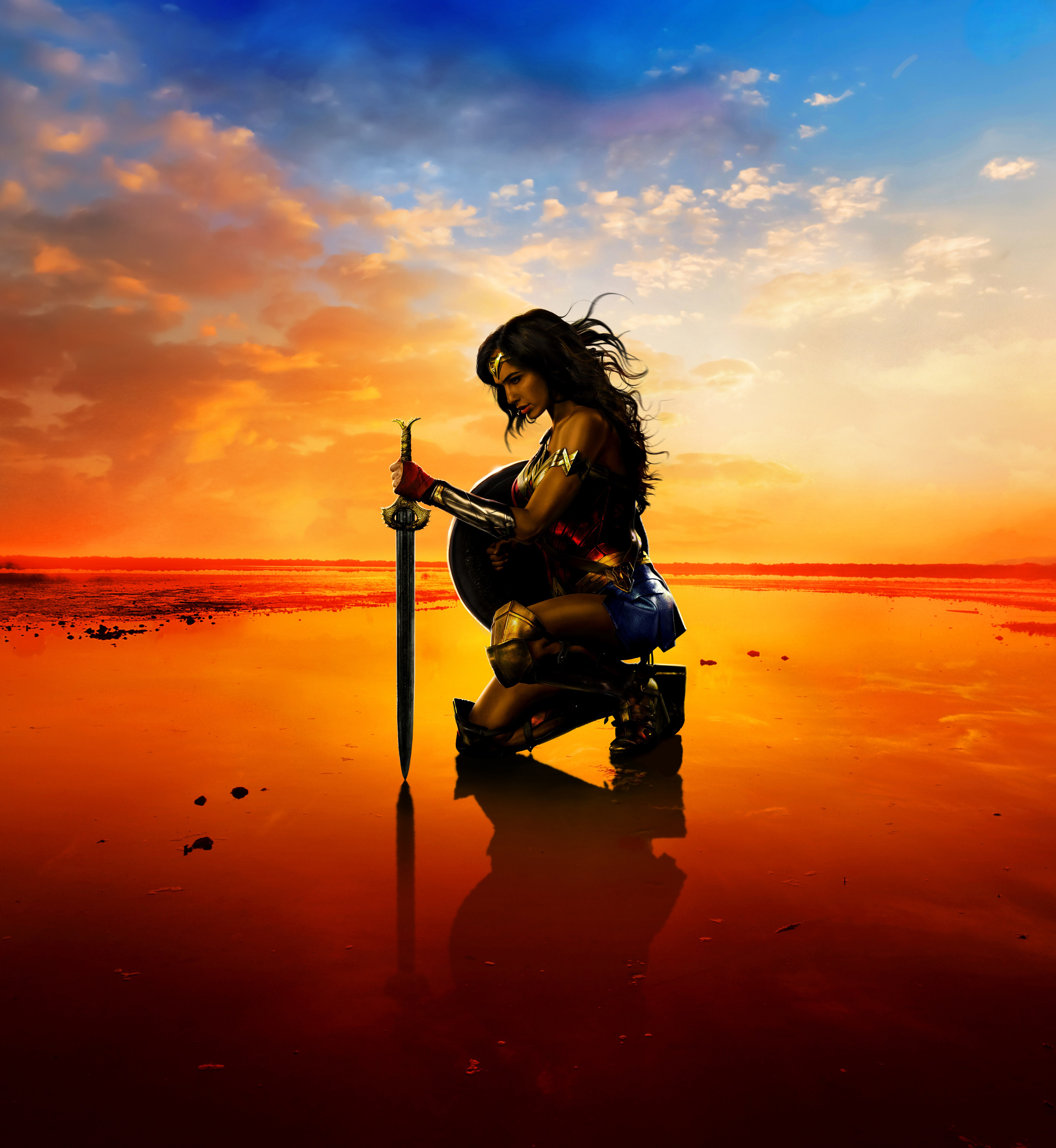 Wonder Woman kneeling with sword and shield HD Wallpaper