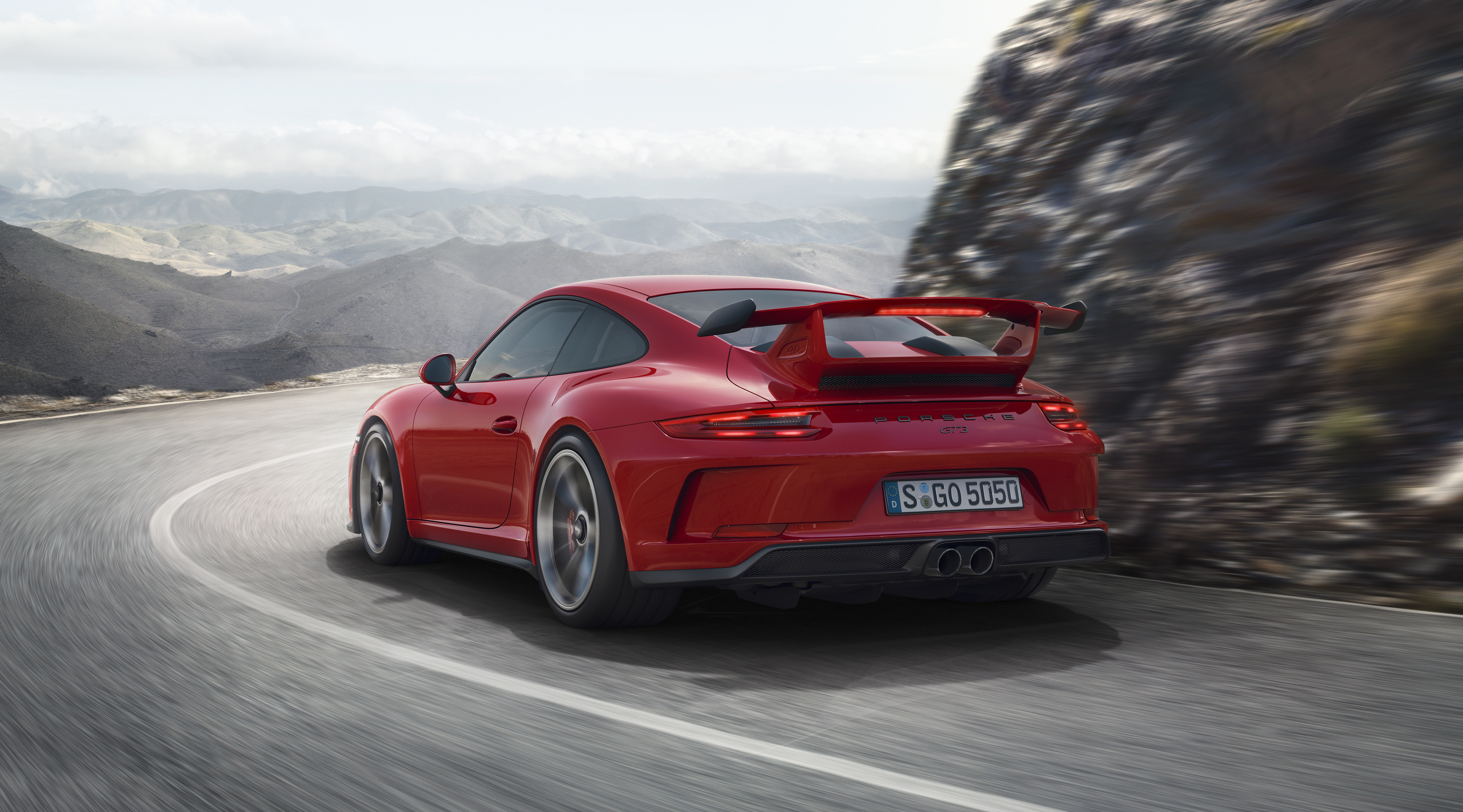 Red 2017 Porsche 911 GT3 on a mountain road HD Wallpaper