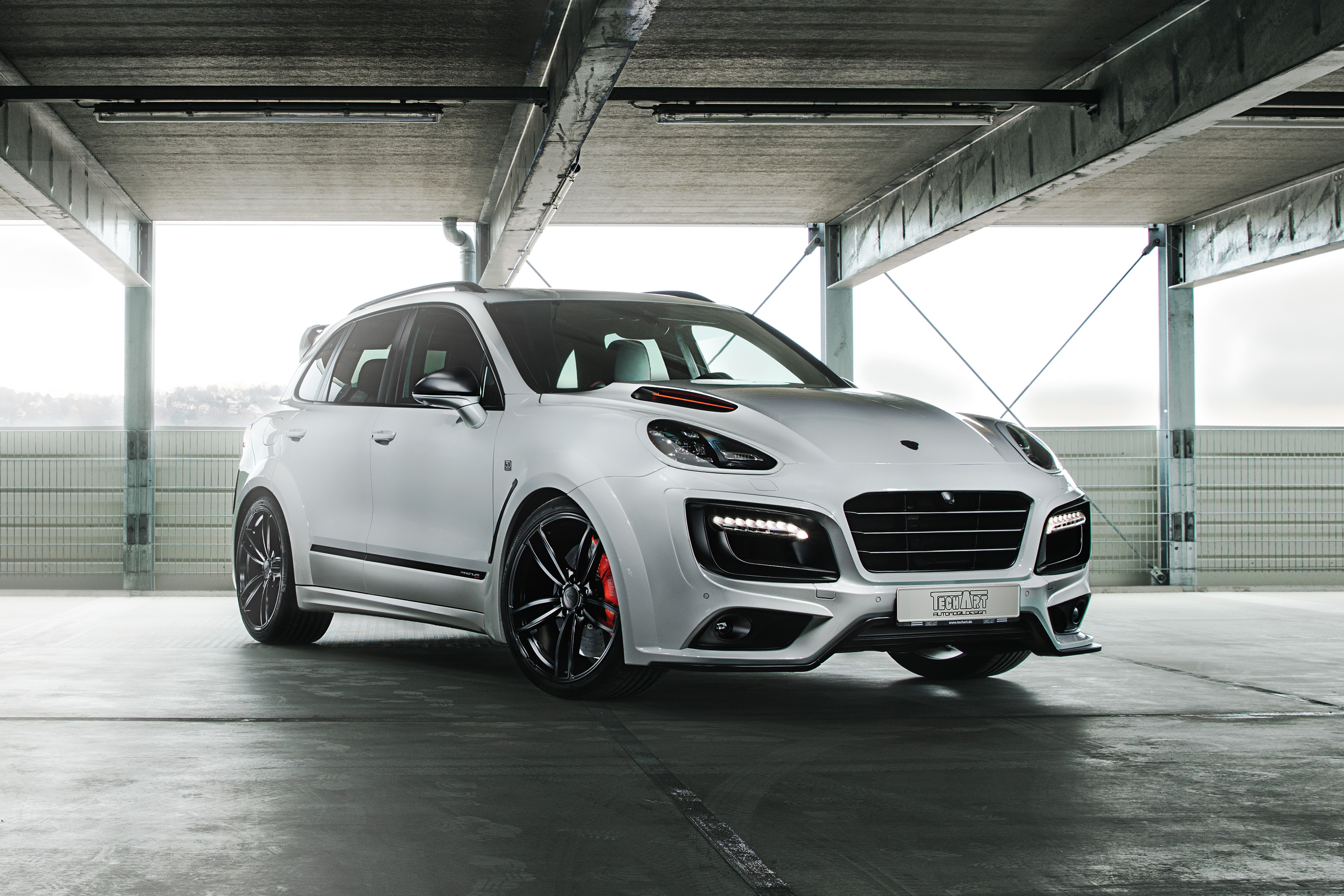 White Techart Magnum Sport Porsche Cayenne in garage HD Wallpaper
