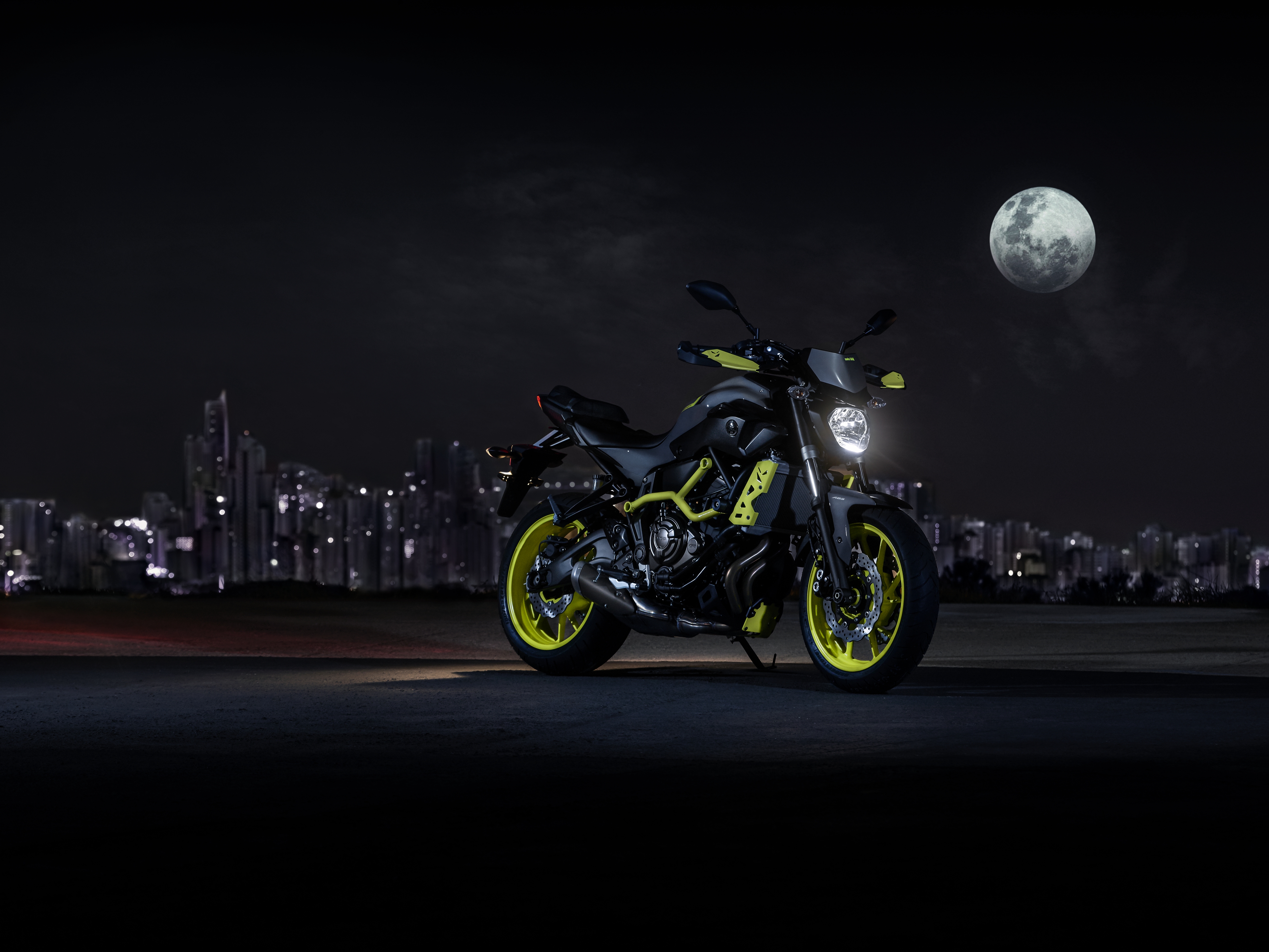 2017 Yamaha MT-07 motorcycle at night with city skyline HD Wallpaper