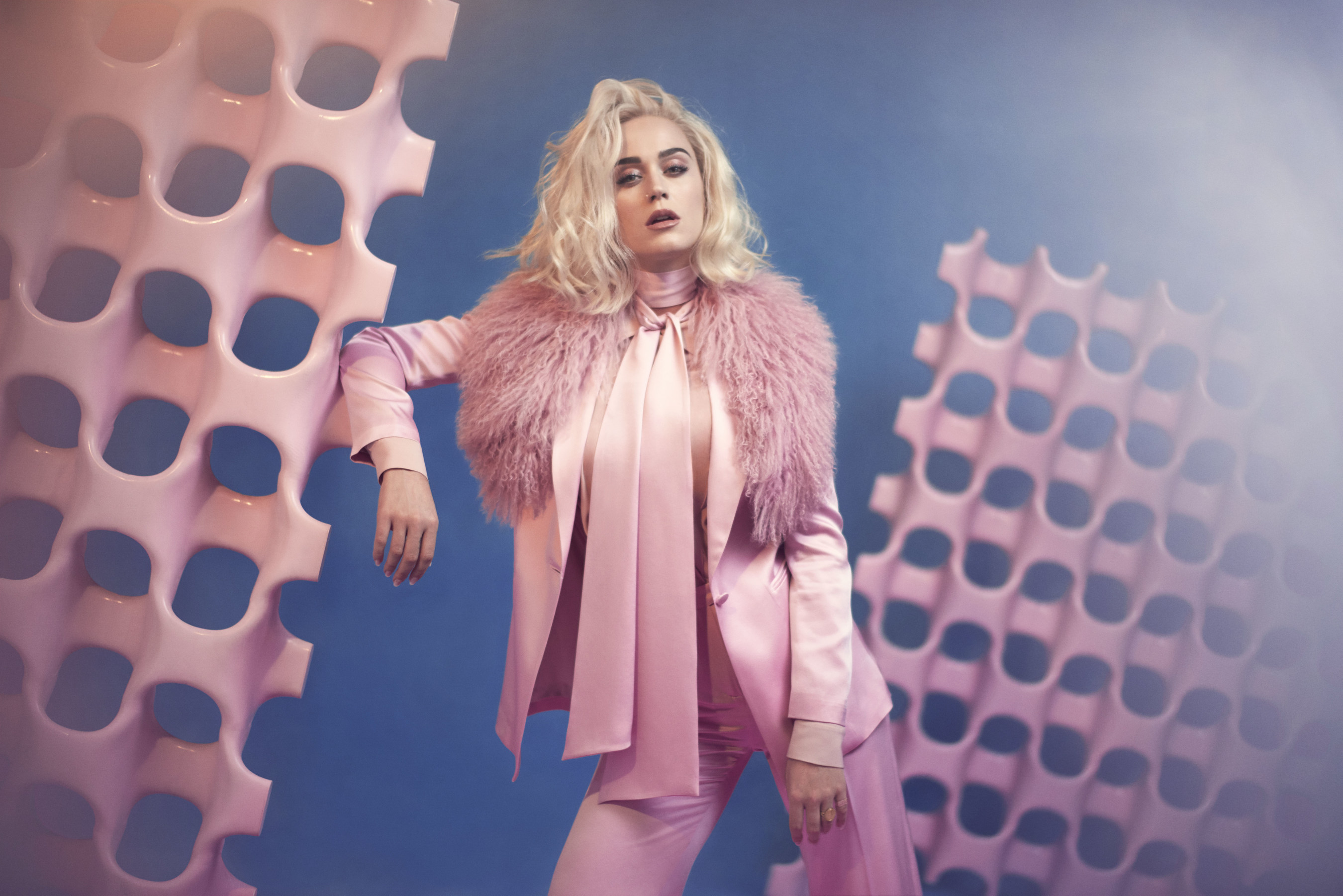 Katy Perry in pink suit with fluffy collar HD Wallpaper