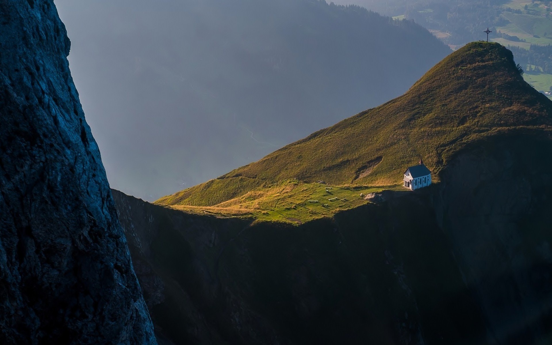 Chapel on a mountain peak with a cross HD Wallpaper