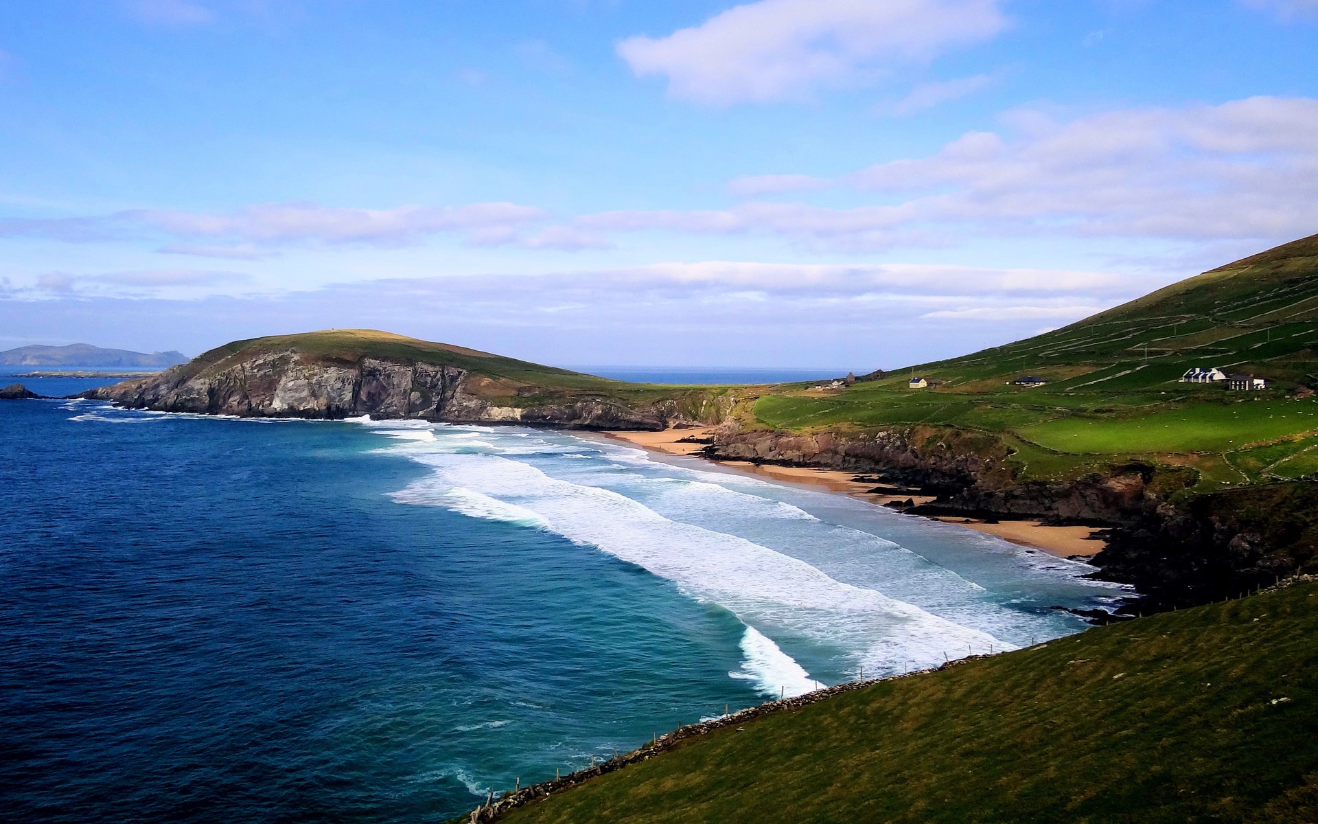 Coastal landscape with green hills and ocean waves HD Wallpaper