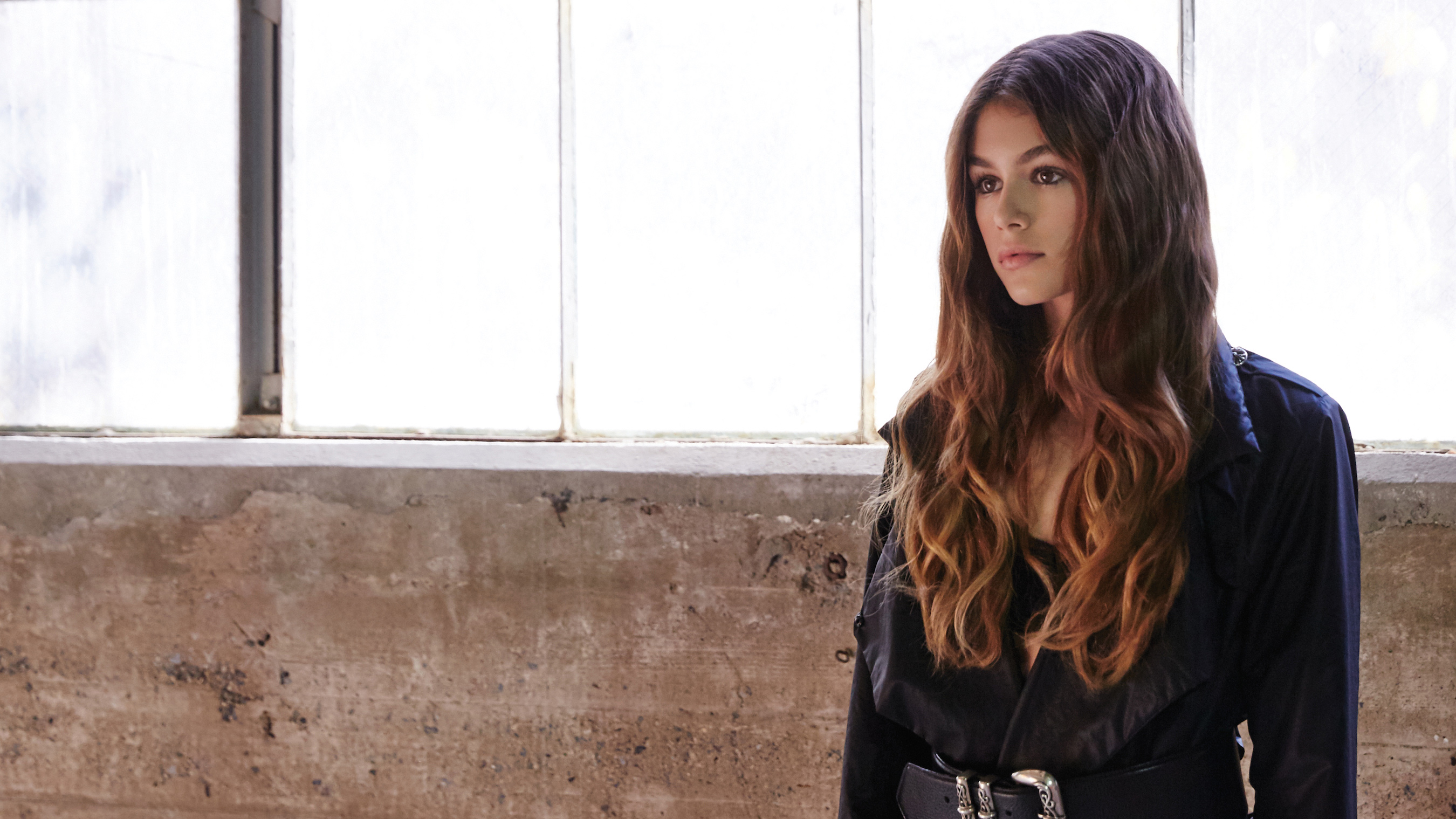 Kaia Gerber in a dark jacket HD Wallpaper