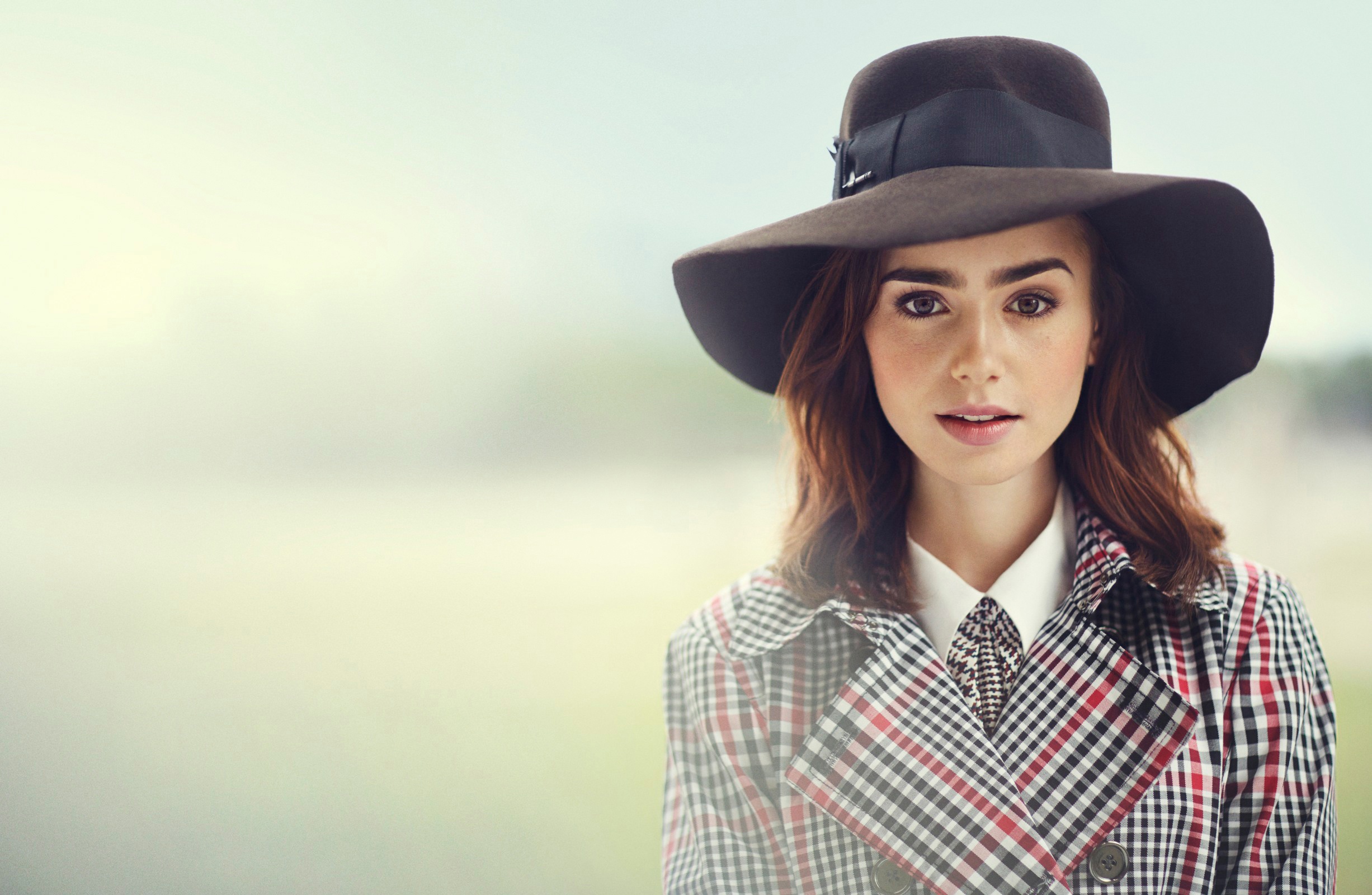 Lily Collins wearing a hat and trench coat HD Wallpaper