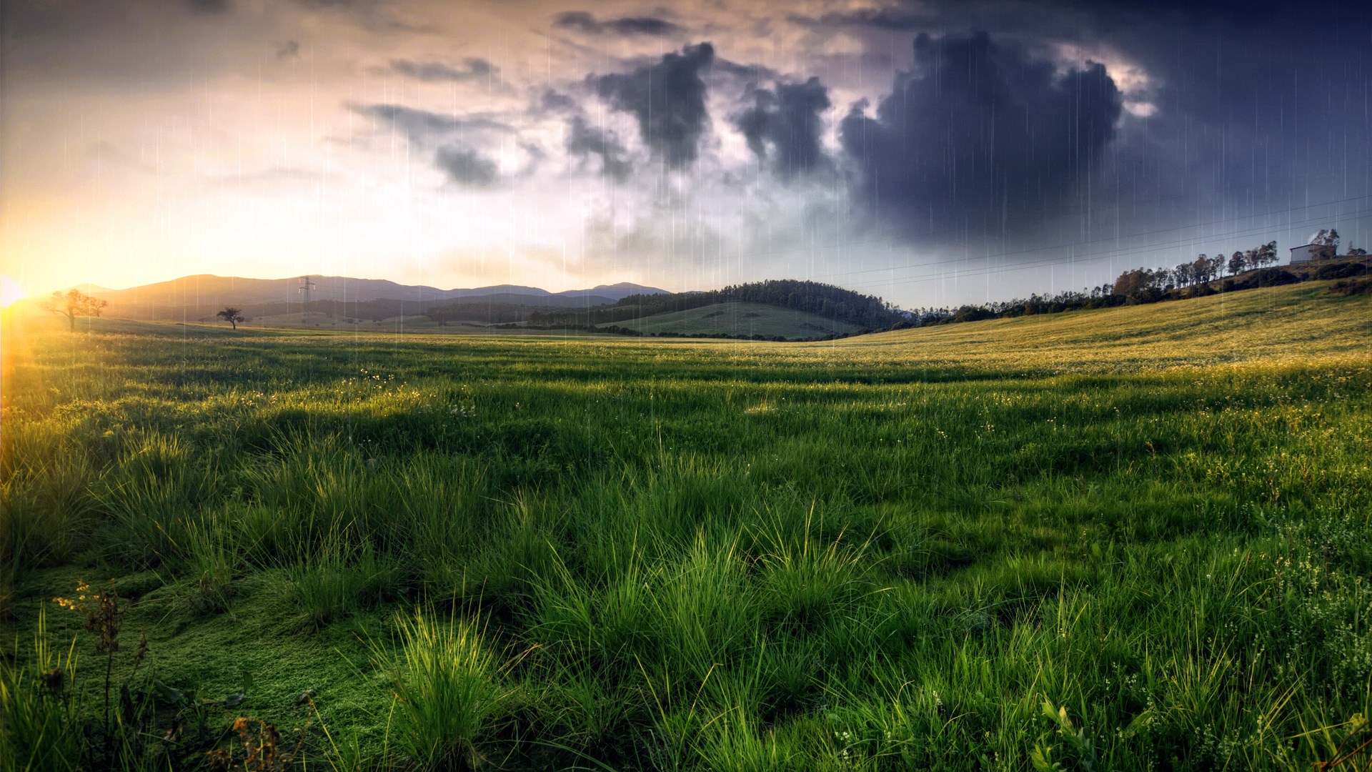 Rainy landscape with rolling hills and sunset HD Wallpaper