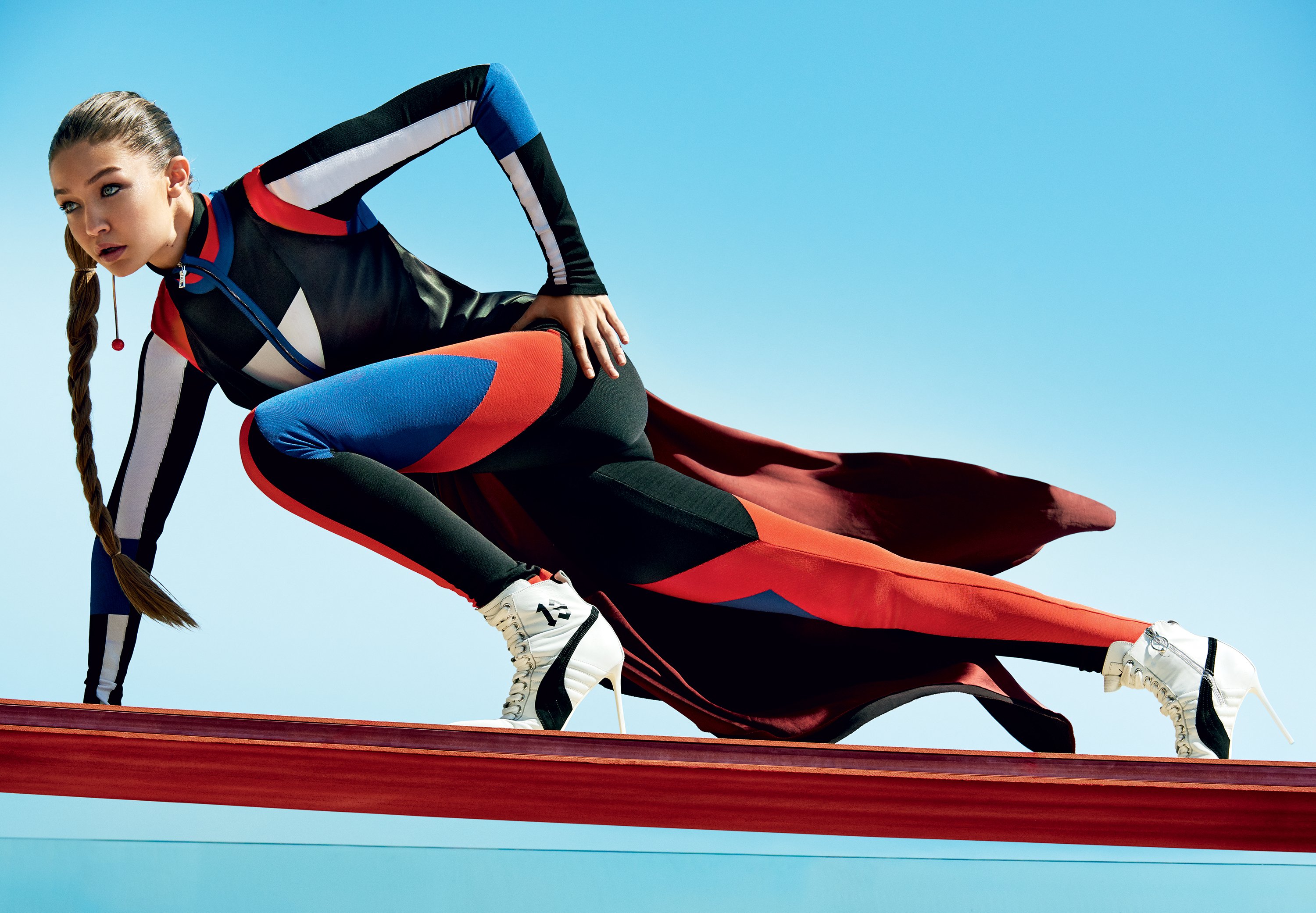 Gigi Hadid in a colorful athletic outfit HD Wallpaper