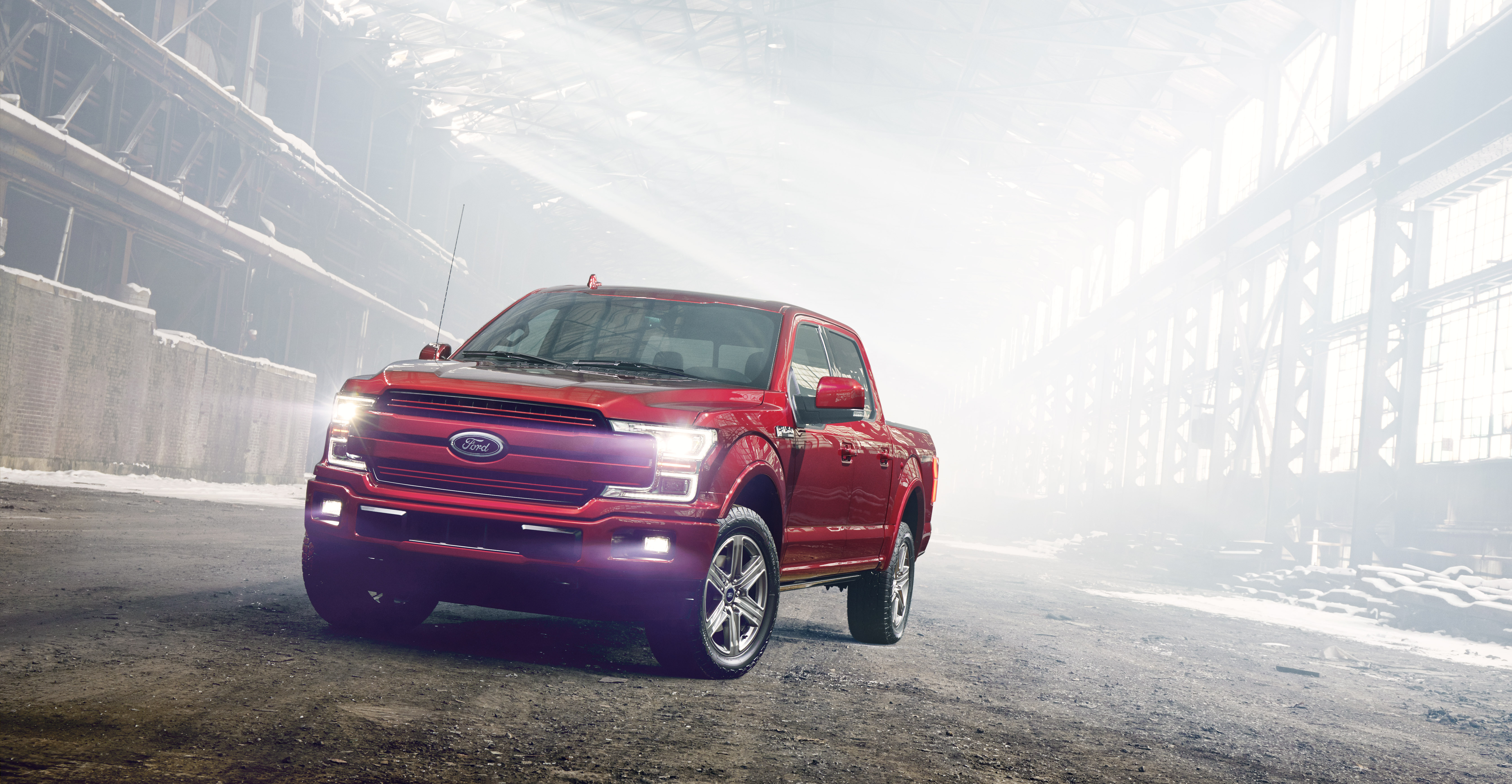 Red Ford F-150 Pickup Truck in Industrial Setting HD Wallpaper