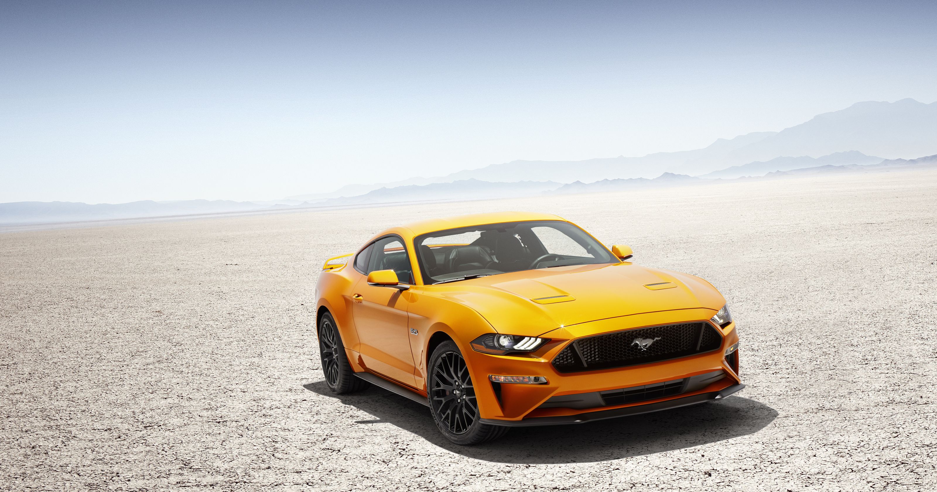 2018 Ford Mustang in a desert landscape HD Wallpaper