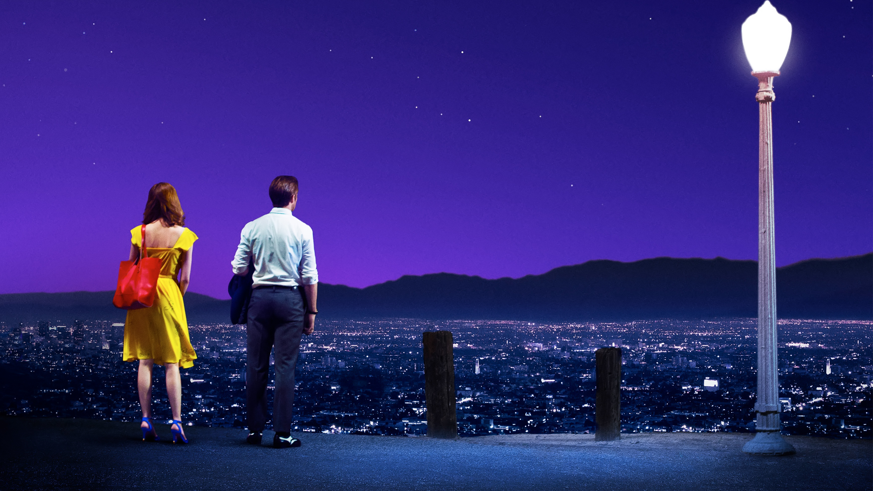 La La Land couple overlooking city at night HD Wallpaper