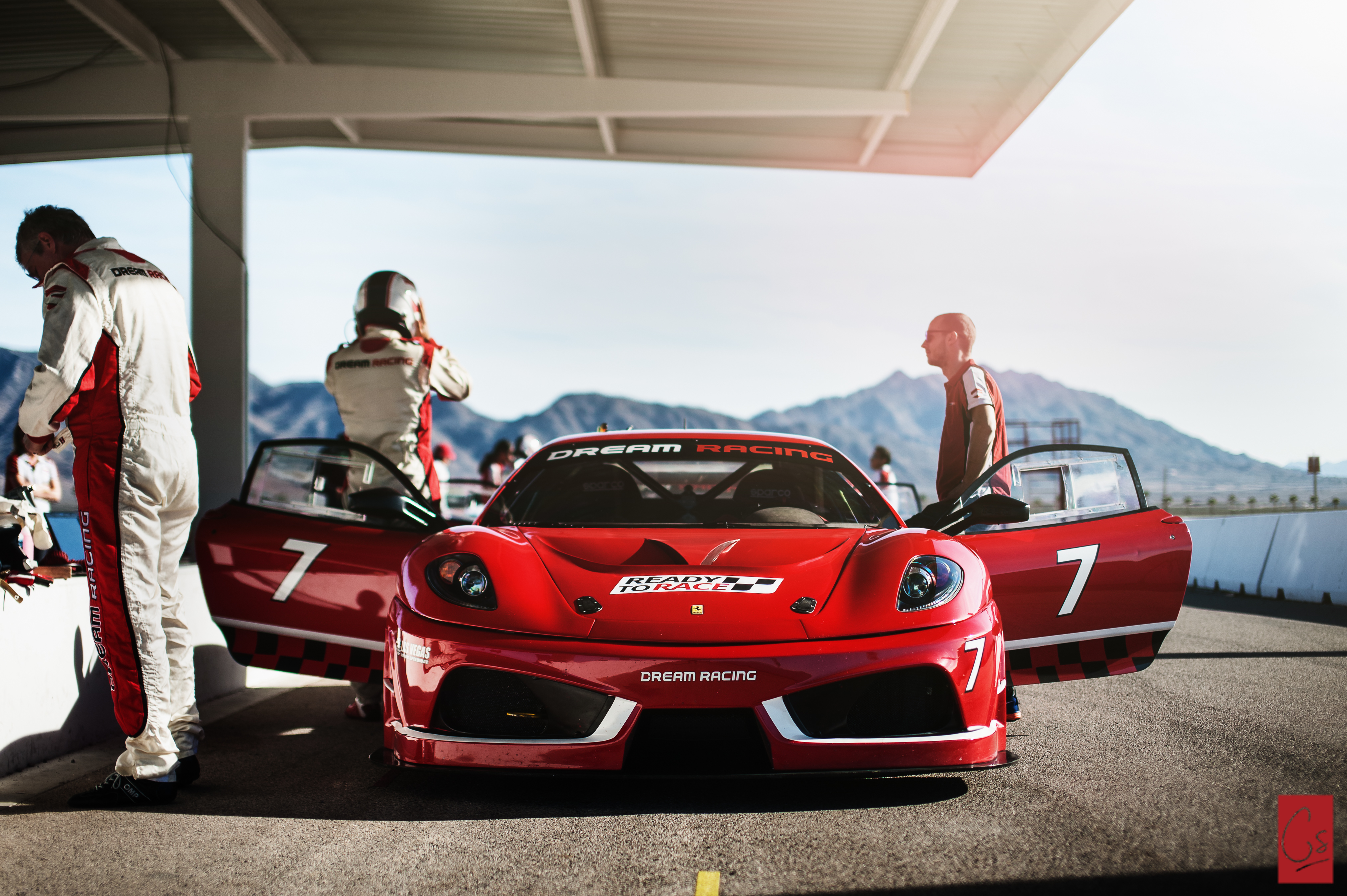Dream Racing Ferrari with Racers HD Wallpaper