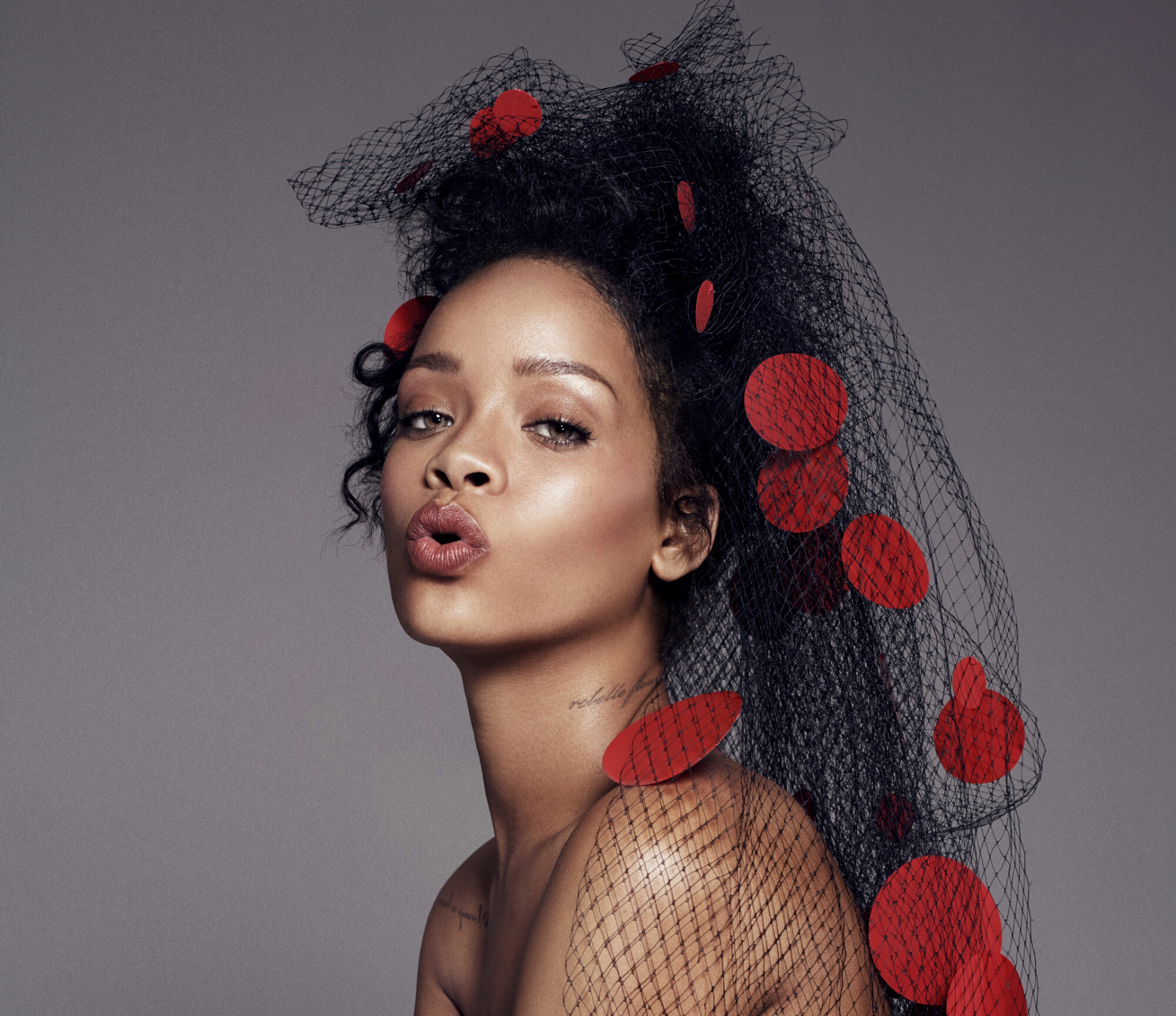 Rihanna wearing a black veil with red polka dots HD Wallpaper