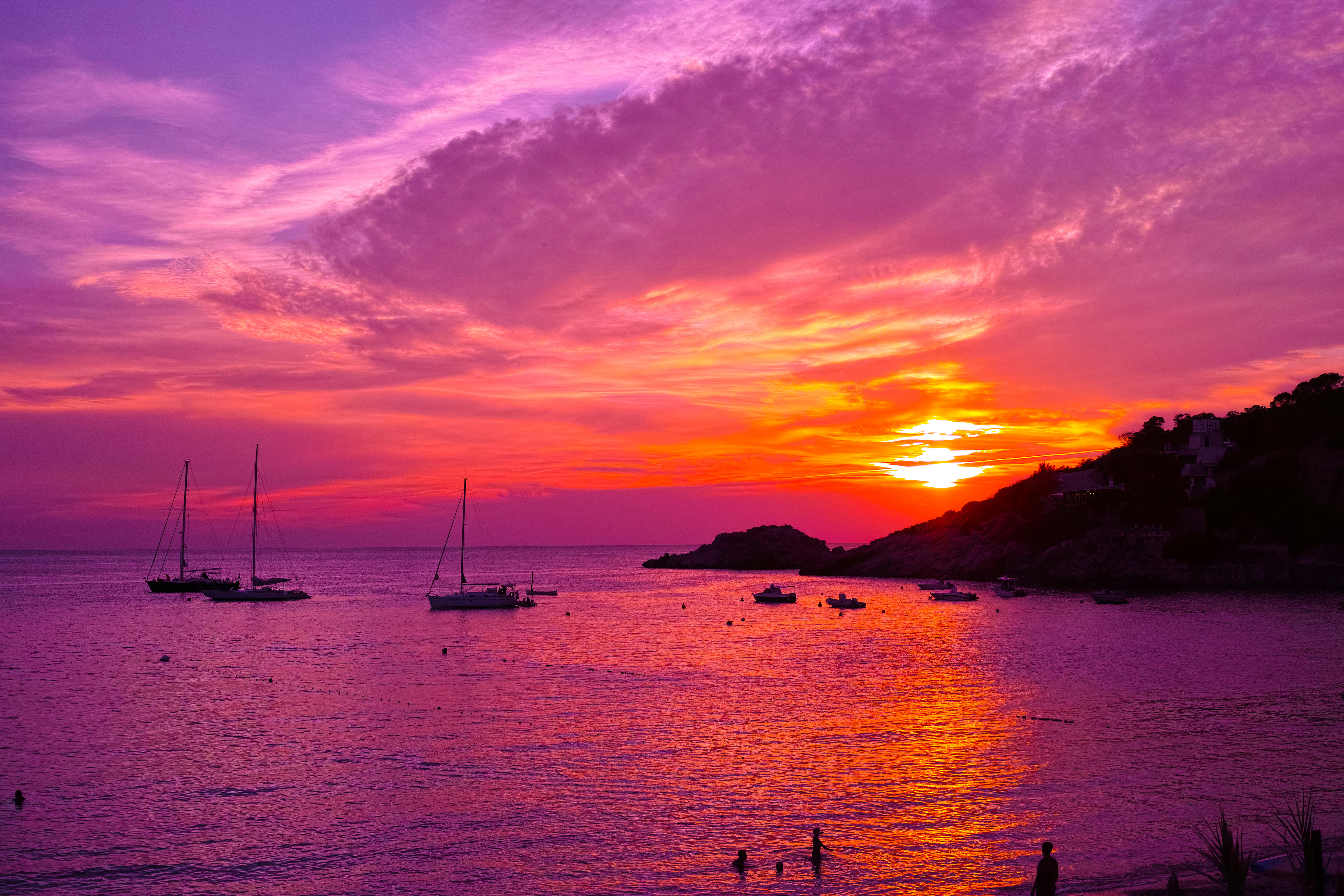 Violet Sunset over the Coast with Sailboats HD Wallpaper