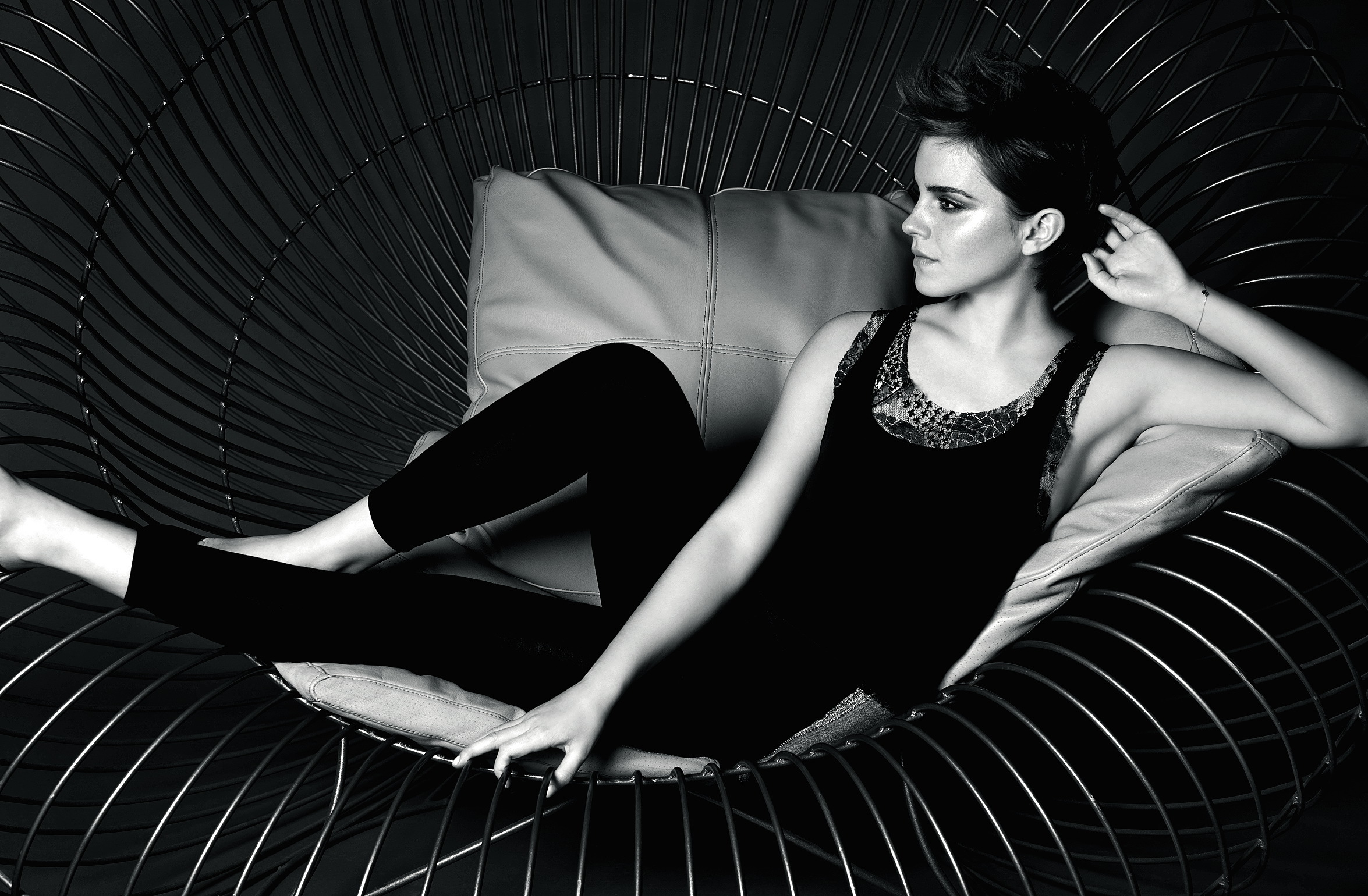 Emma Watson in a black tank top and leggings HD Wallpaper