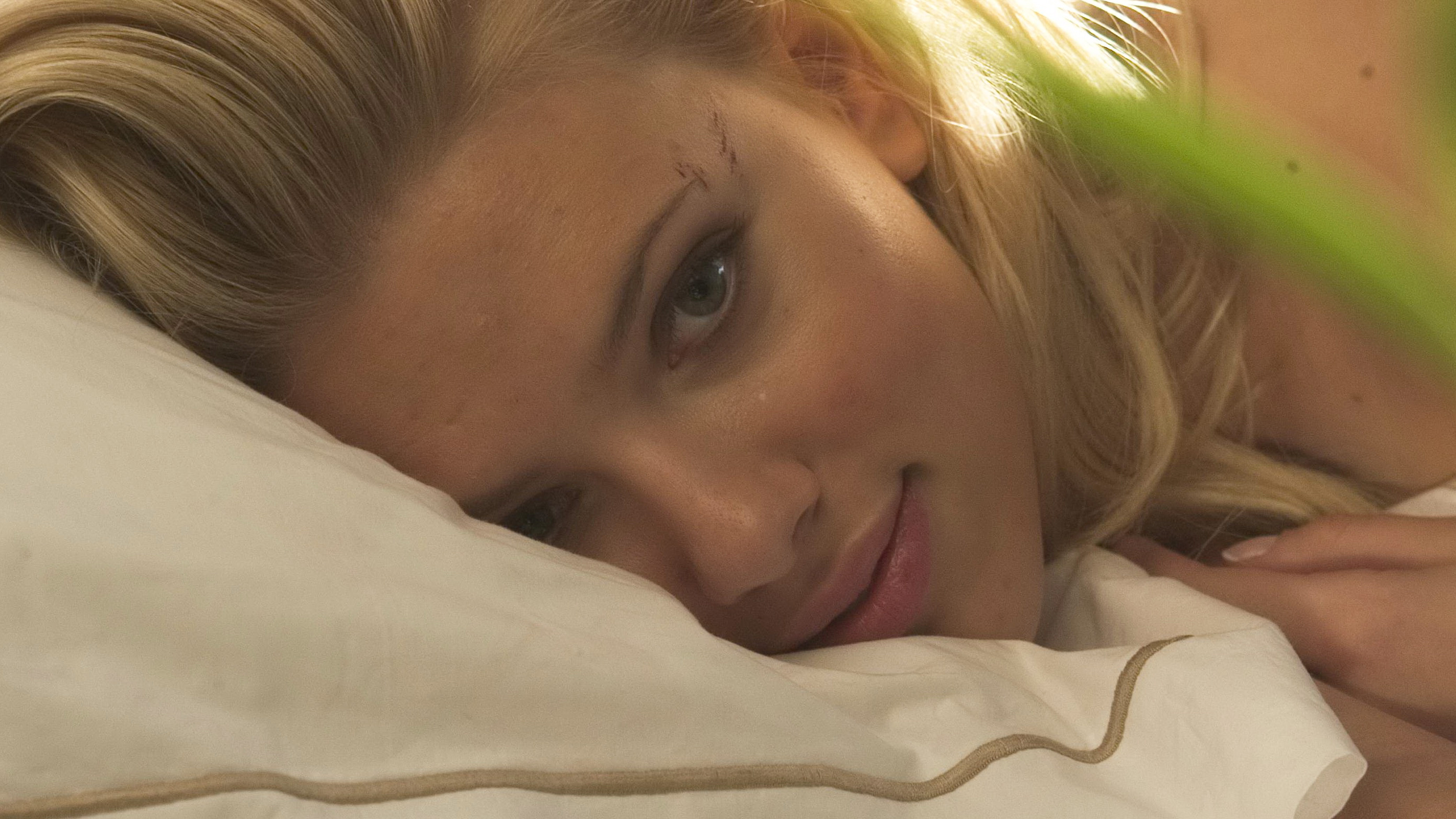 Scarlett Johansson lying on a pillow HD Wallpaper