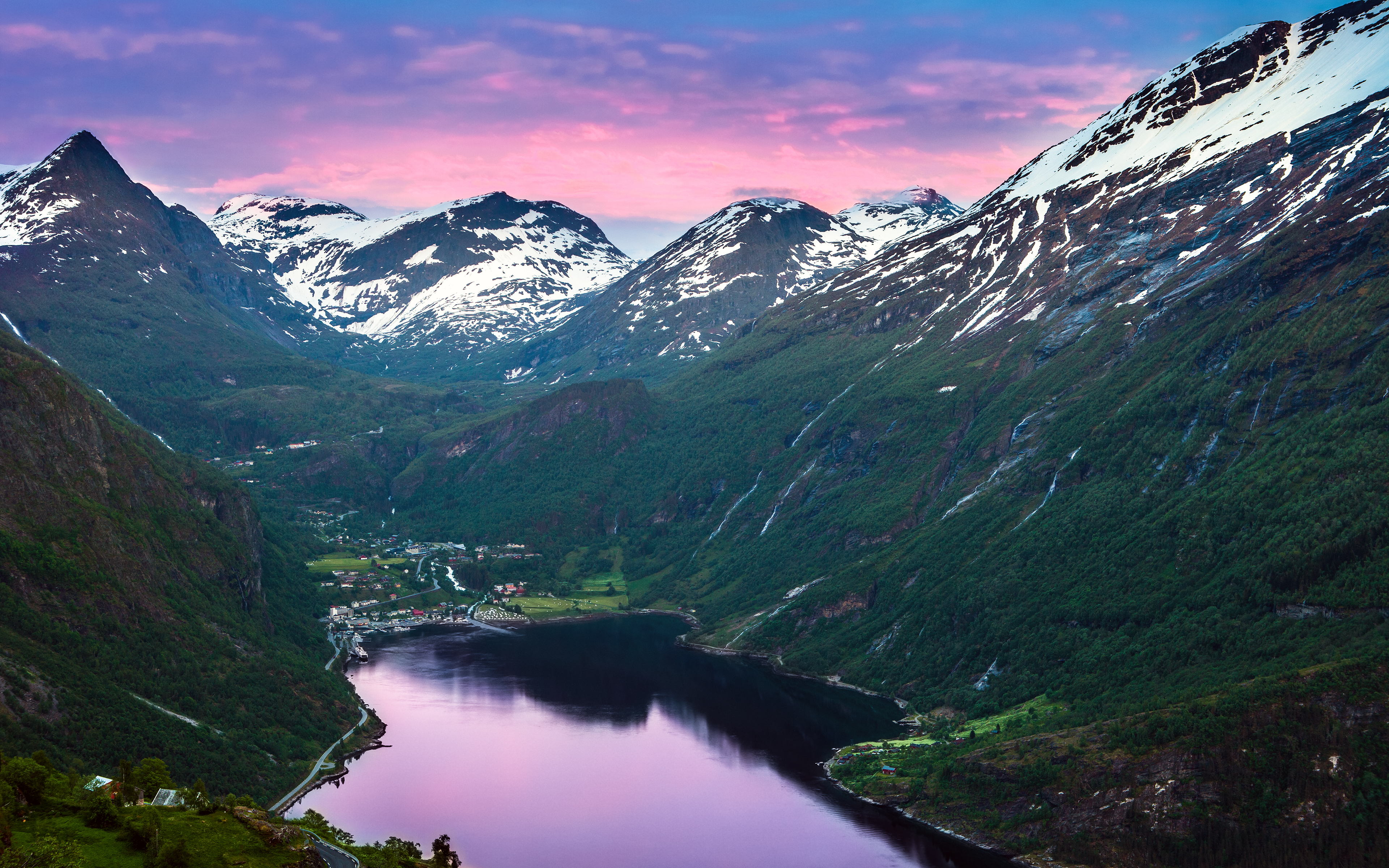 Geiranger Fjord Village with Snow-Capped Mountains in Norway HD Wallpaper