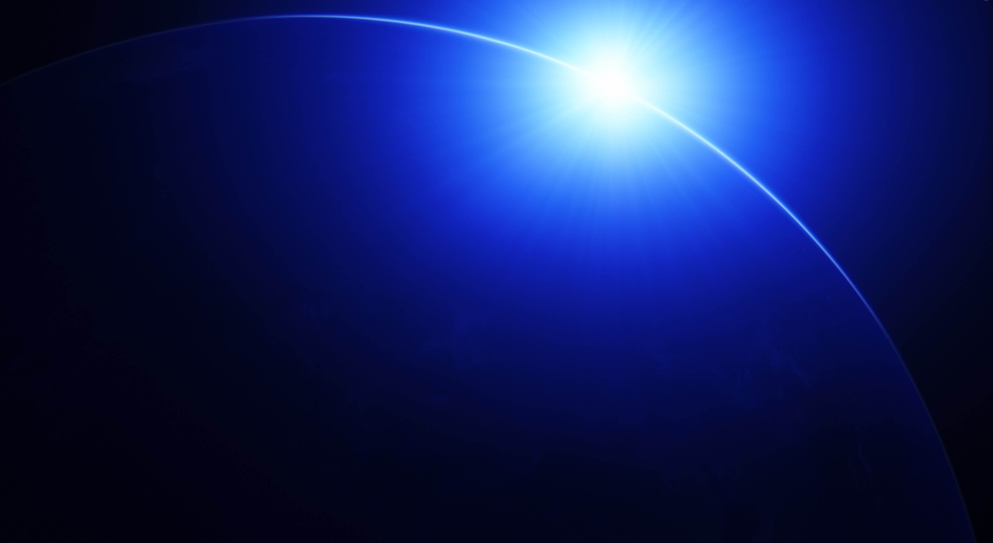 Bright light over a dark blue curved surface HD Wallpaper