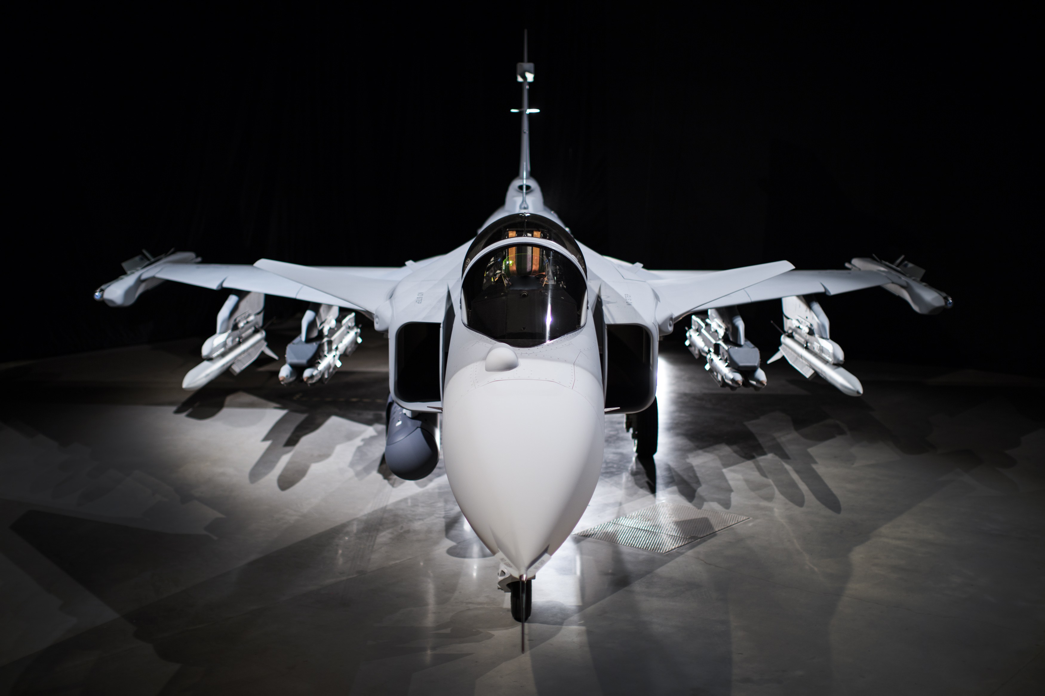 Saab JAS 39 Gripen fighter jet with missiles HD Wallpaper