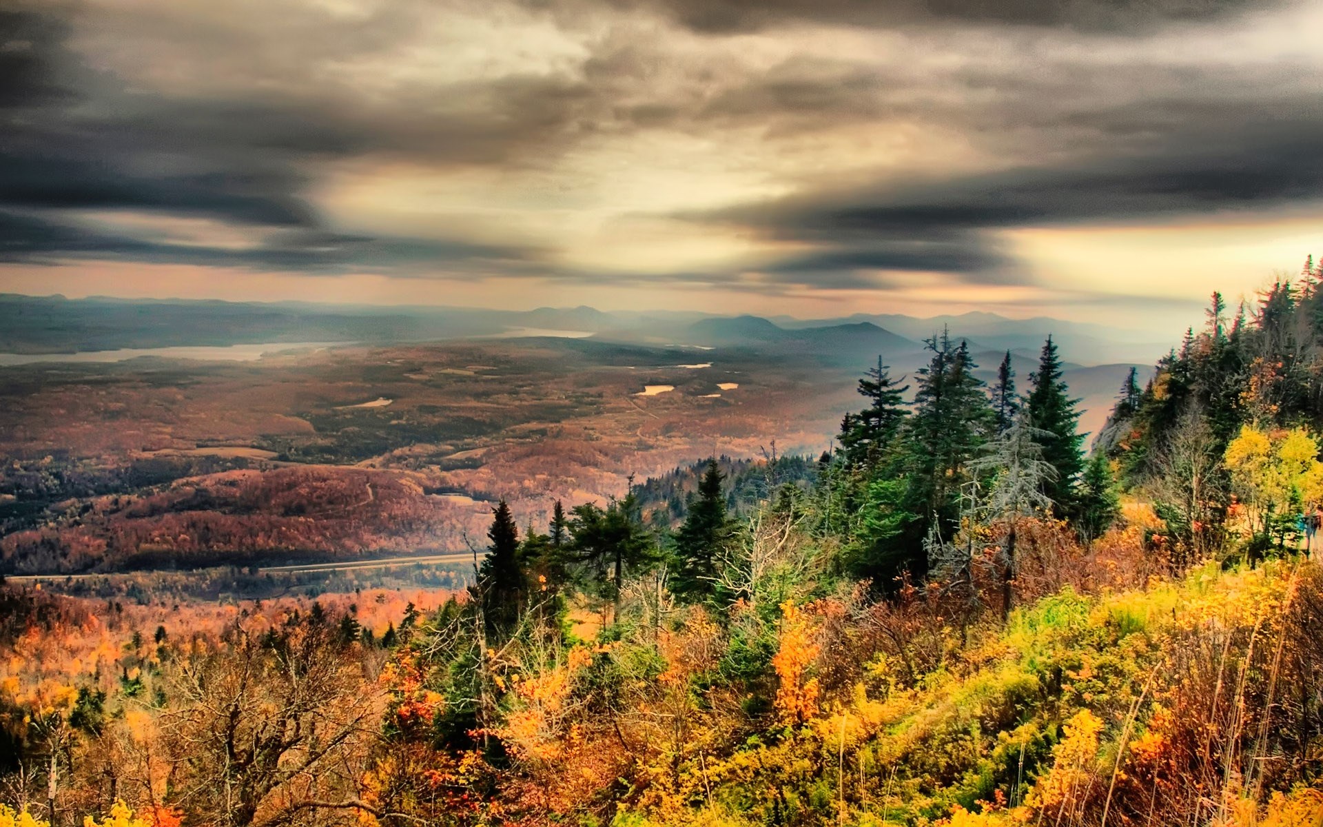 Autumn mountain landscape with distant lakes and stormy sky HD Wallpaper