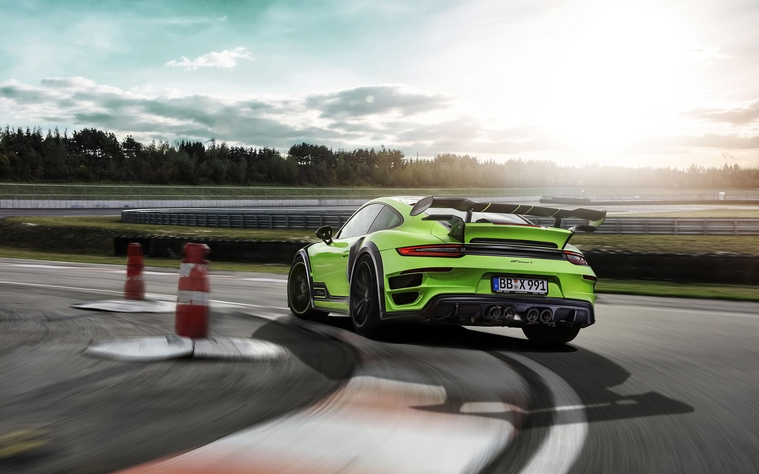 Green Porsche 911 Turbo GTstreet R on a race track HD Wallpaper