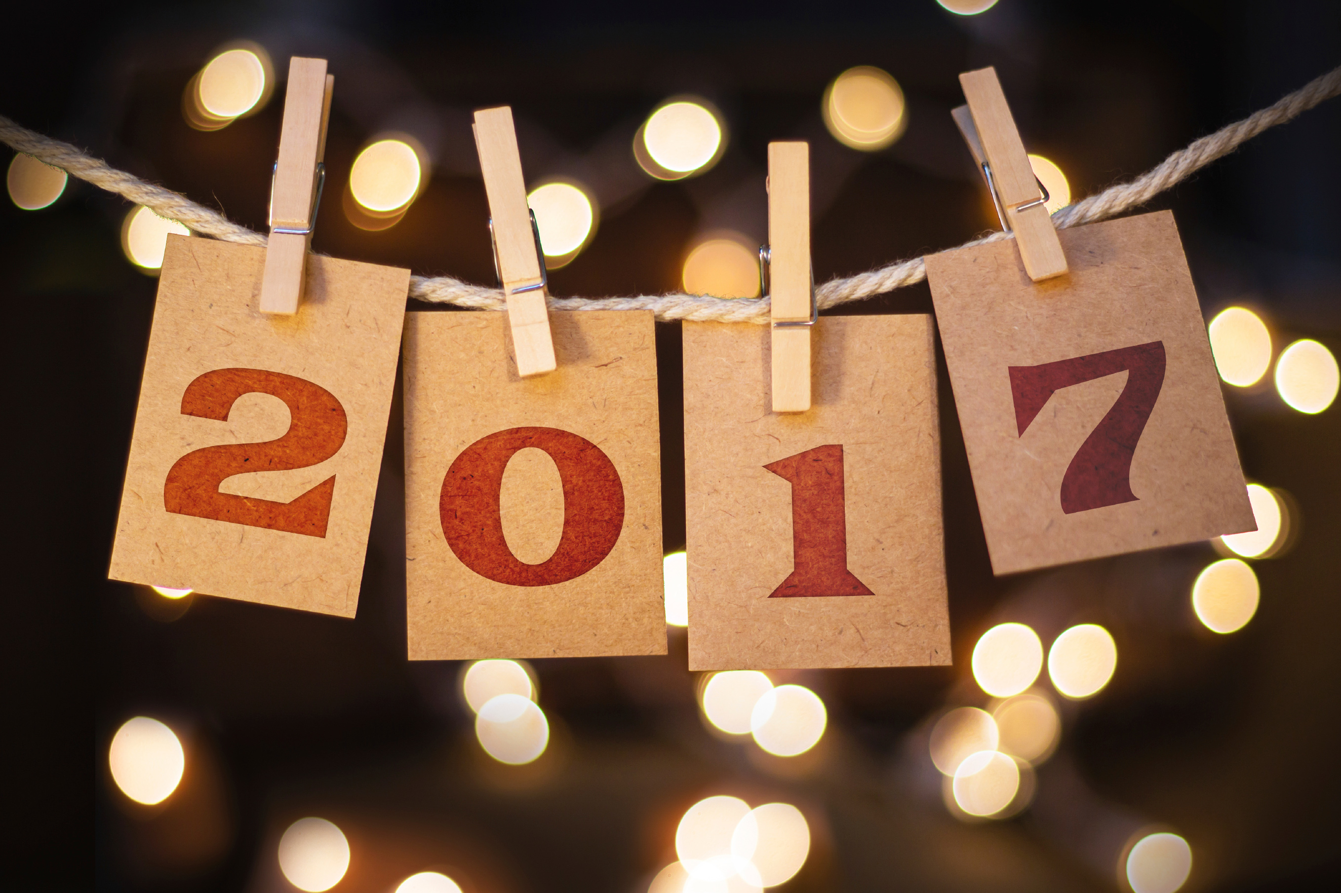 2017 numbers on cards with bokeh lights HD Wallpaper