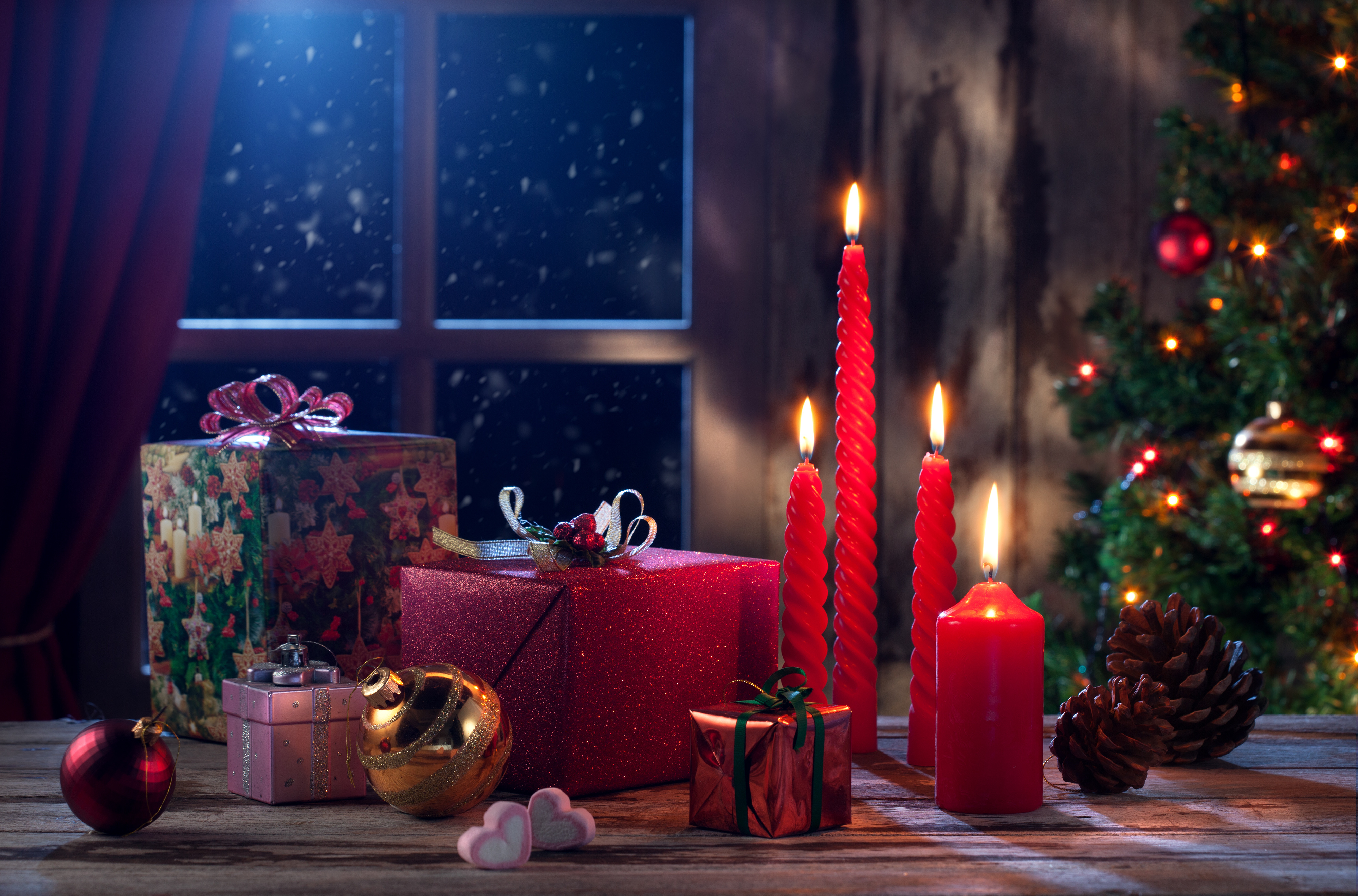 Christmas Eve Gifts and Candles by the Window HD Wallpaper