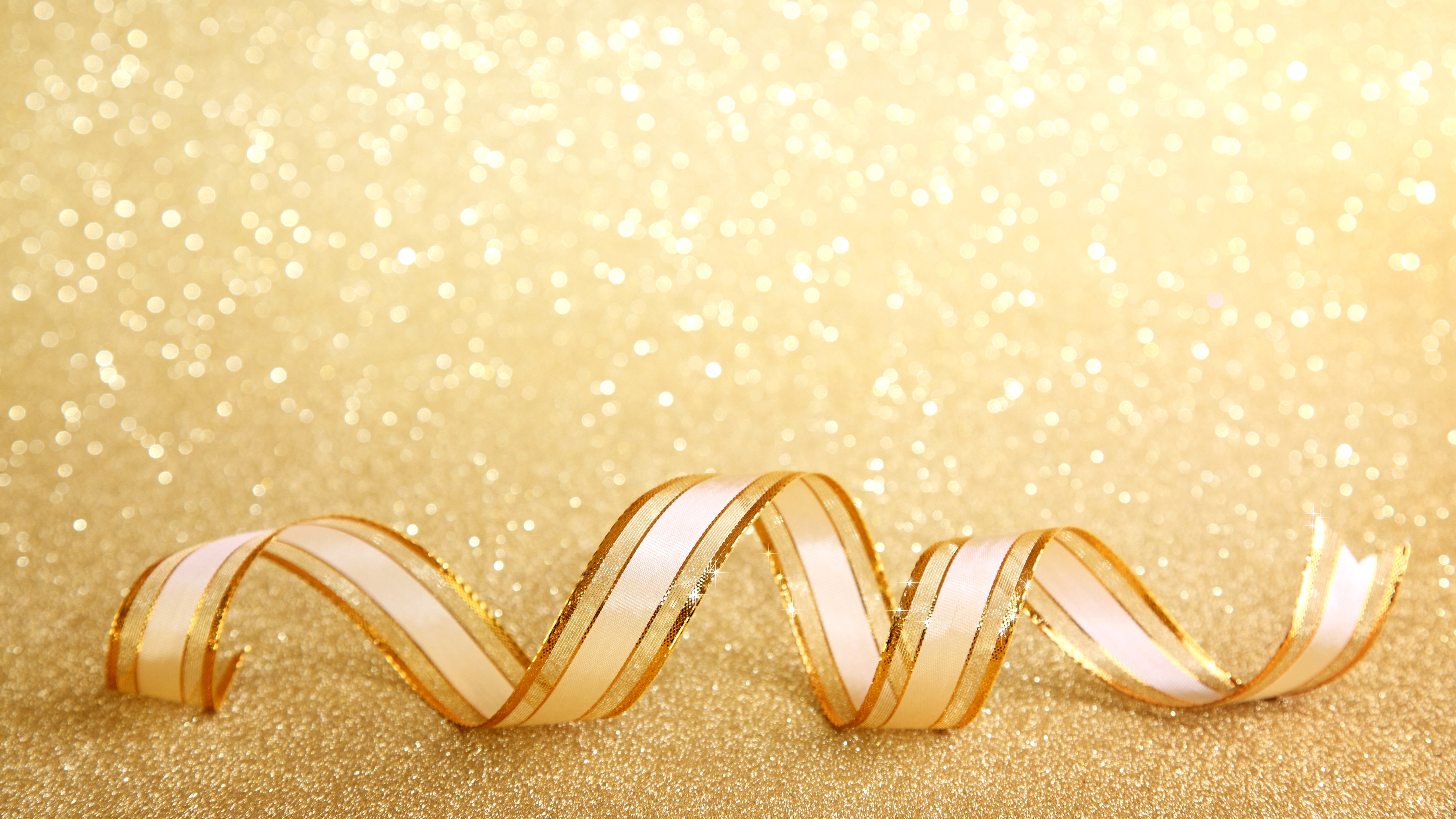 Golden ribbon with bokeh background HD Wallpaper