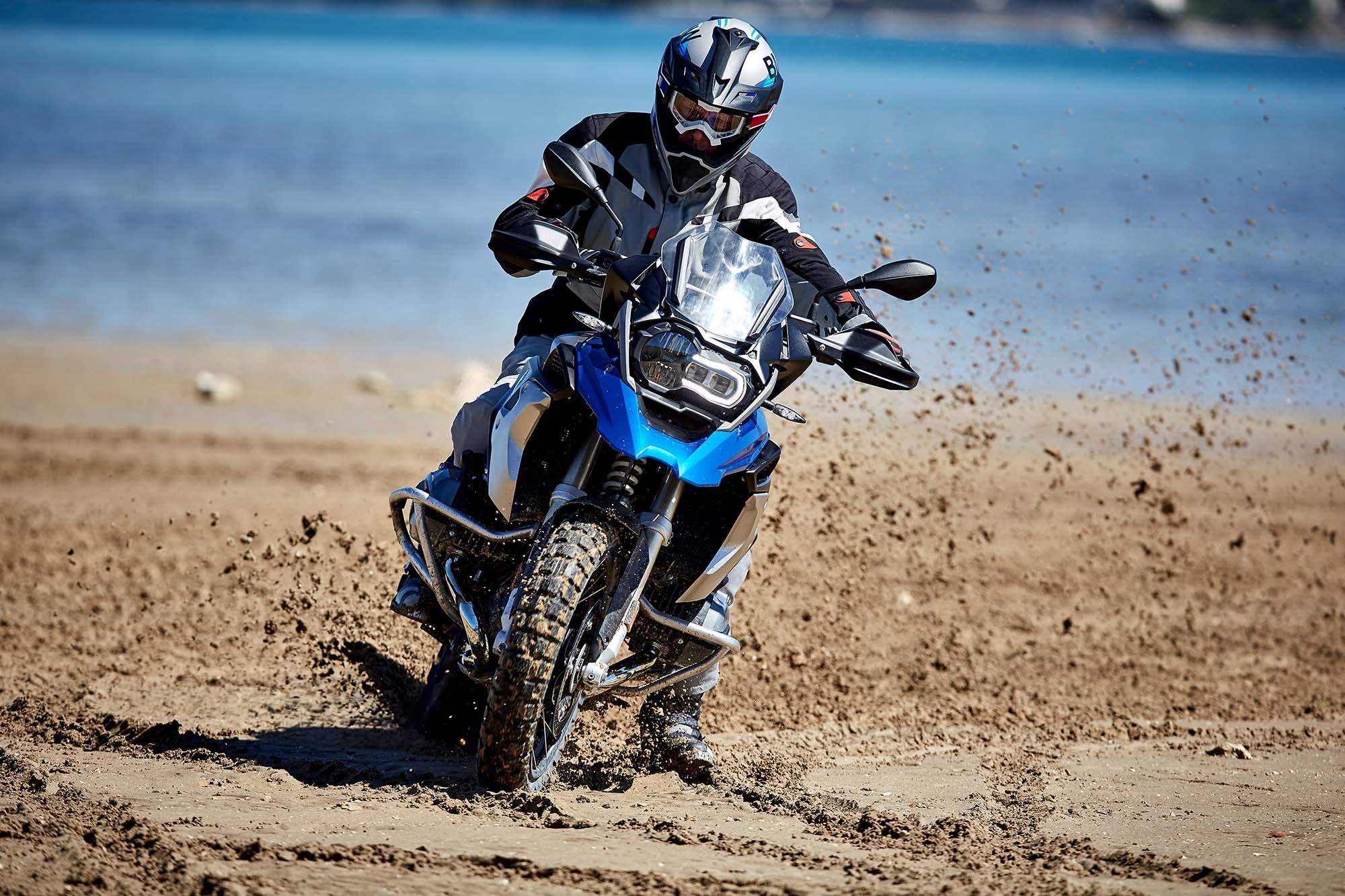 BMW R1200GS Rallye motorcycle on a beach HD Wallpaper