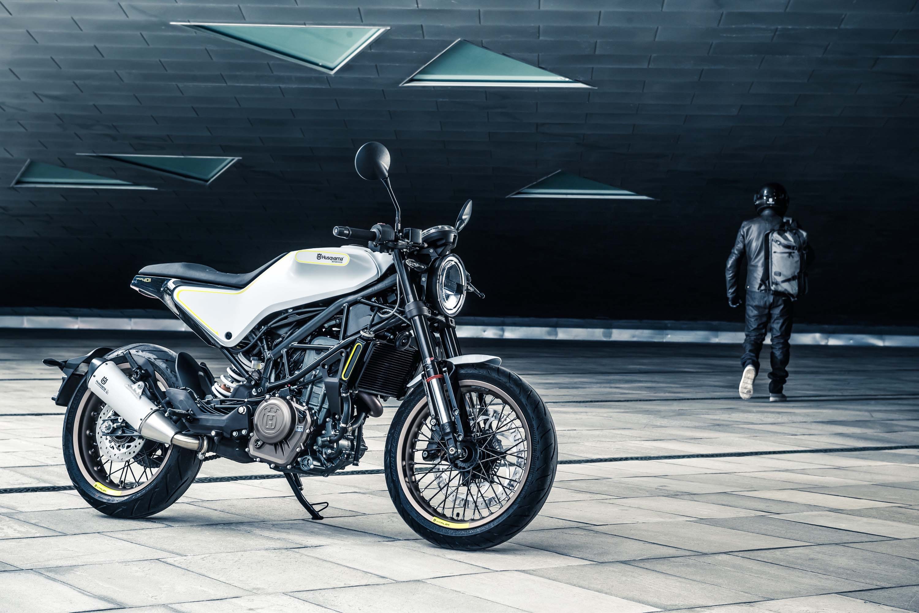 Husqvarna Vitpilen 401 motorcycle and a person HD Wallpaper