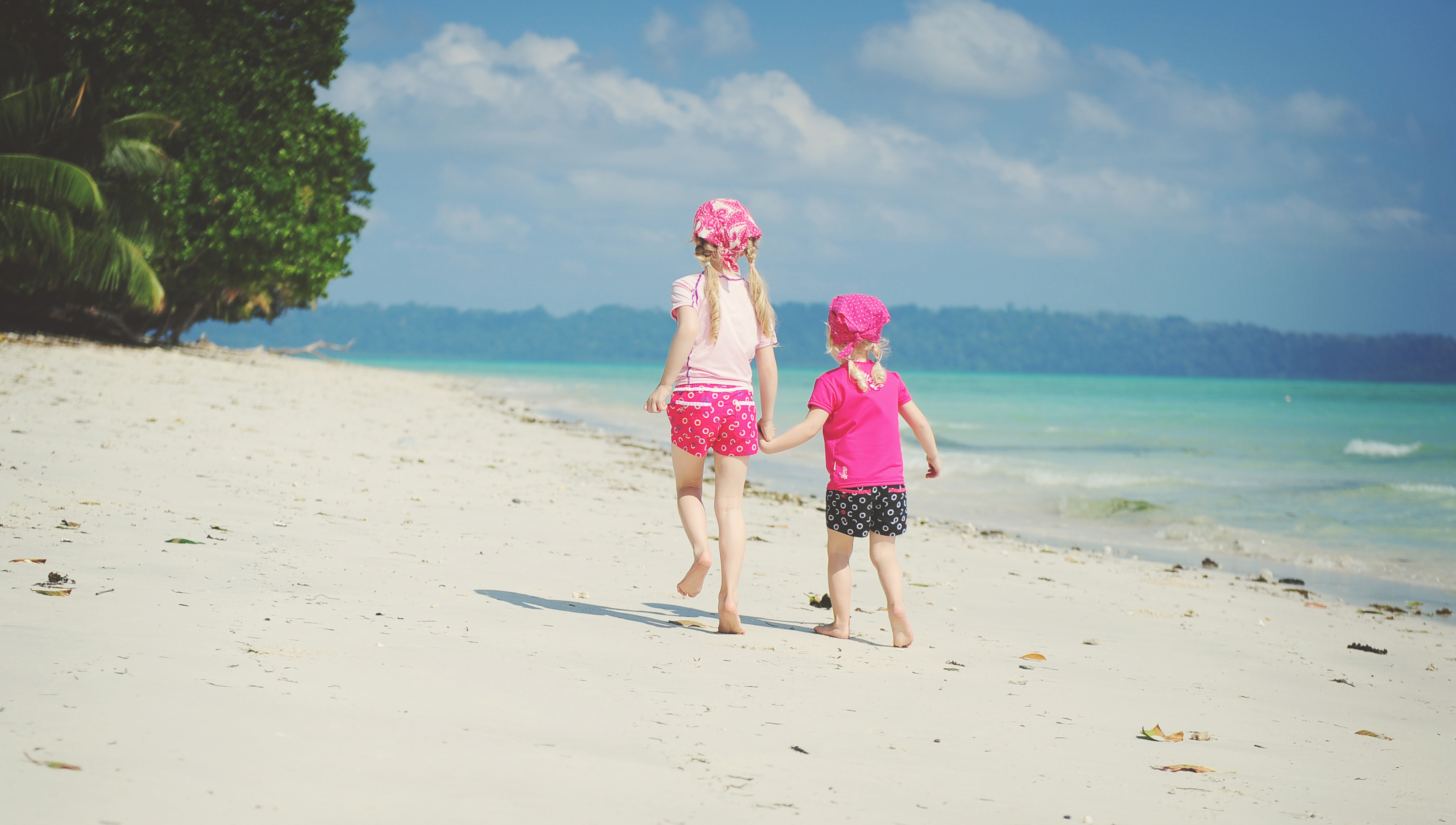 Two girls walking on a beach in Andaman Islands 4K HD Wallpaper