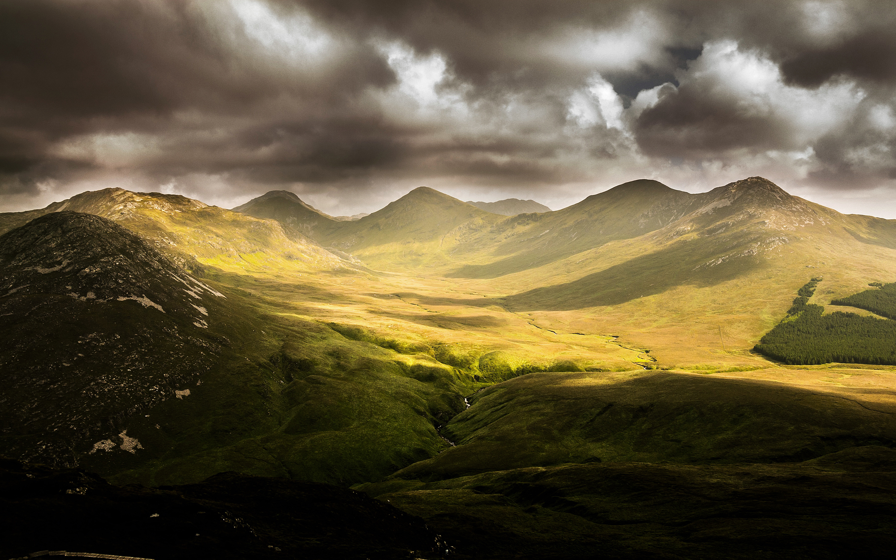 Dramatic mountain landscape with sunlit valley HD Wallpaper