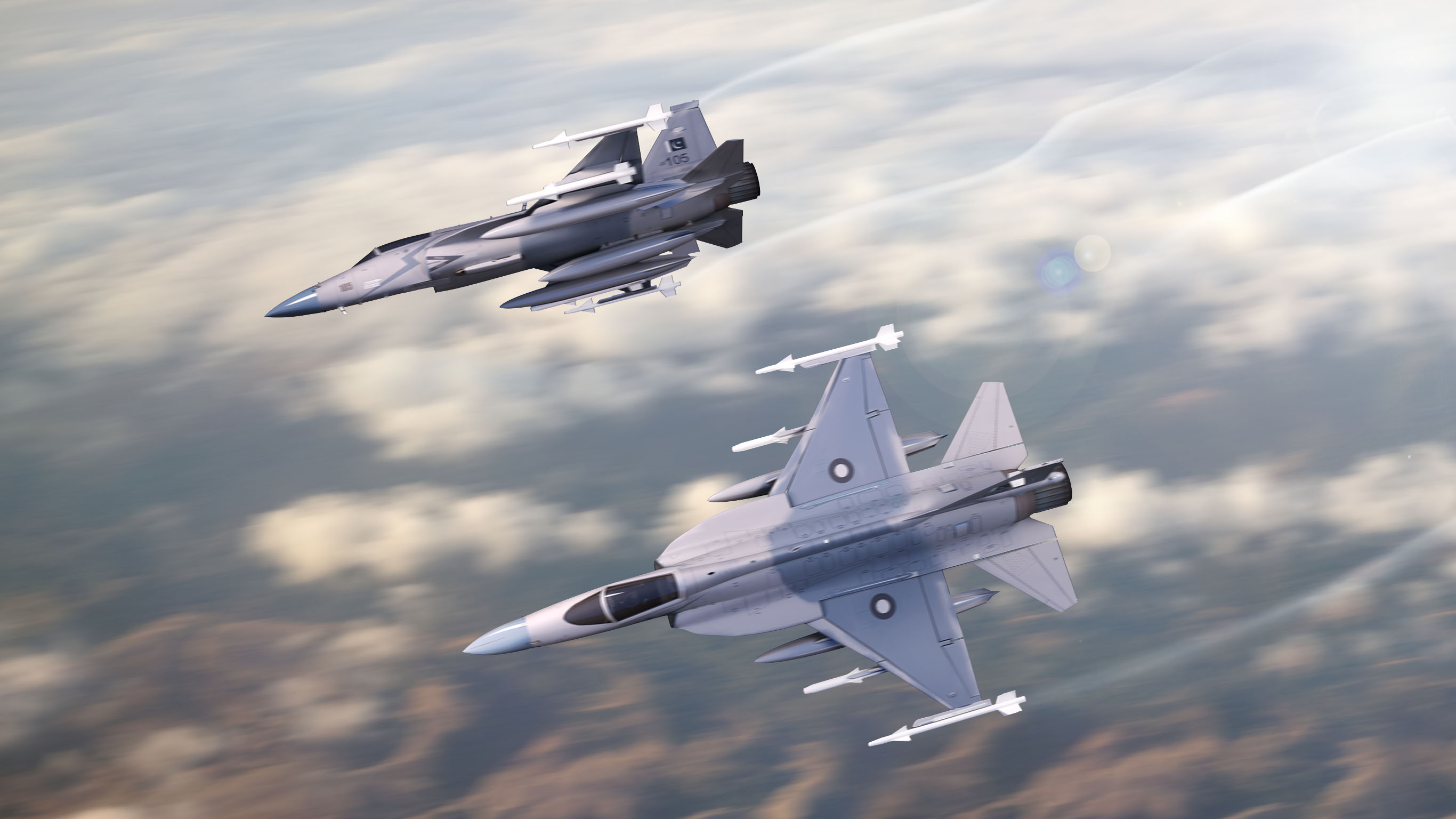Two CAC/PAC JF-17 Thunder fighter aircraft in flight HD Wallpaper