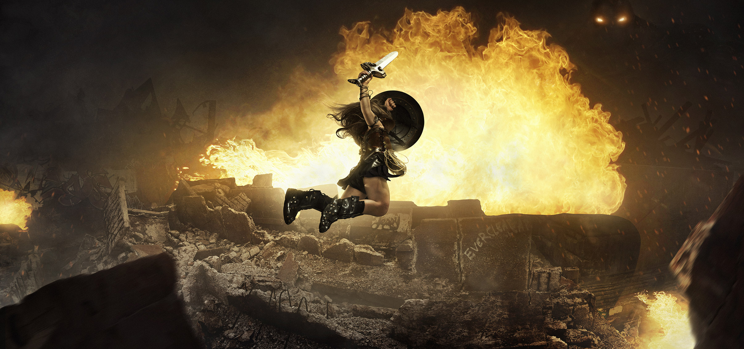Wonder Woman in a battle scene with fire HD Wallpaper