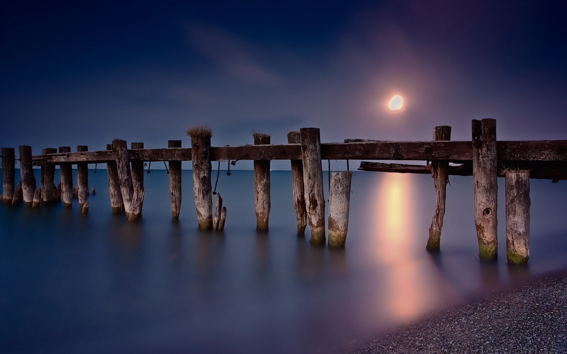 Old wooden pier at night with moon reflection HD Wallpaper