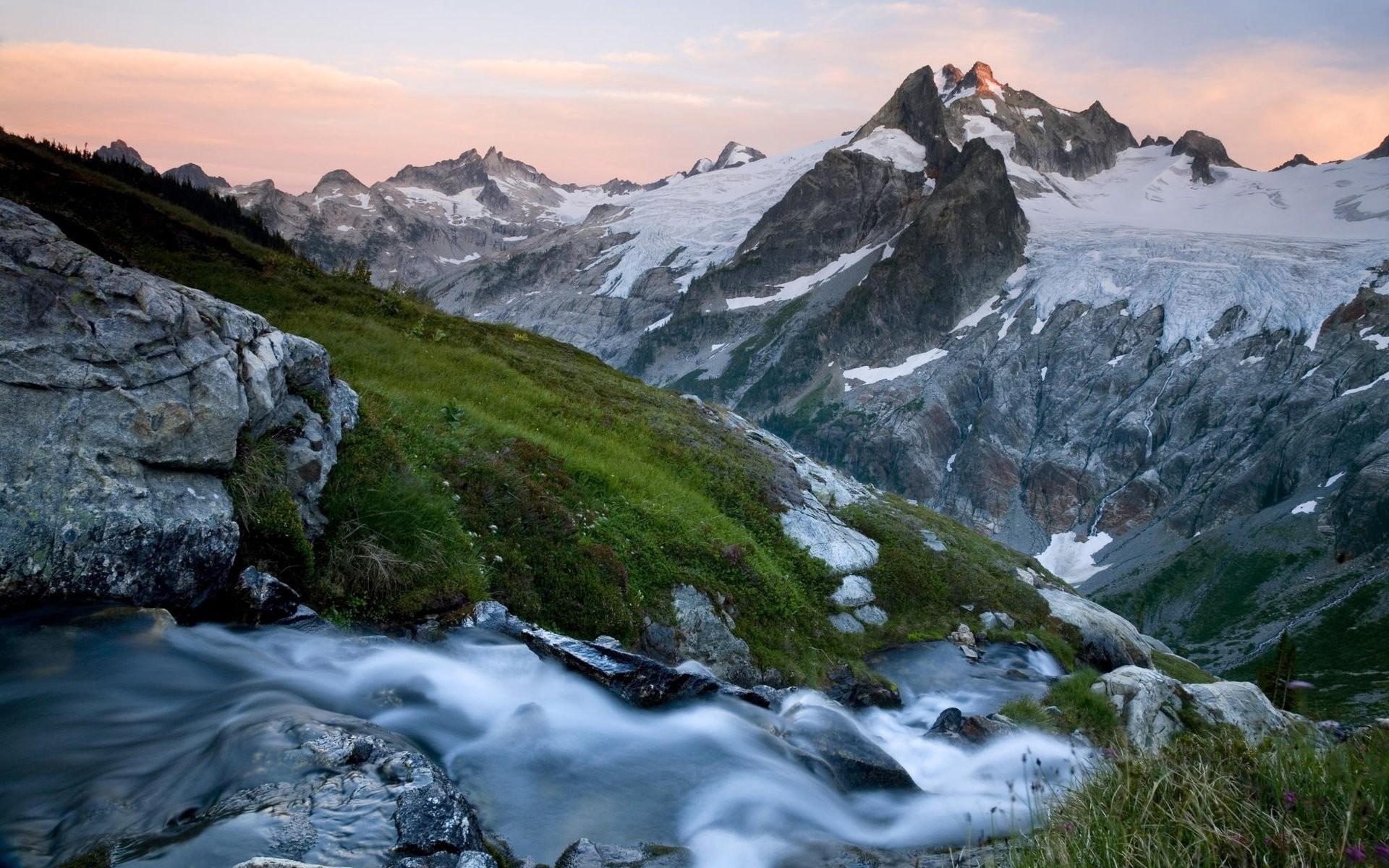 Mountain range with glacier and stream at sunset HD Wallpaper