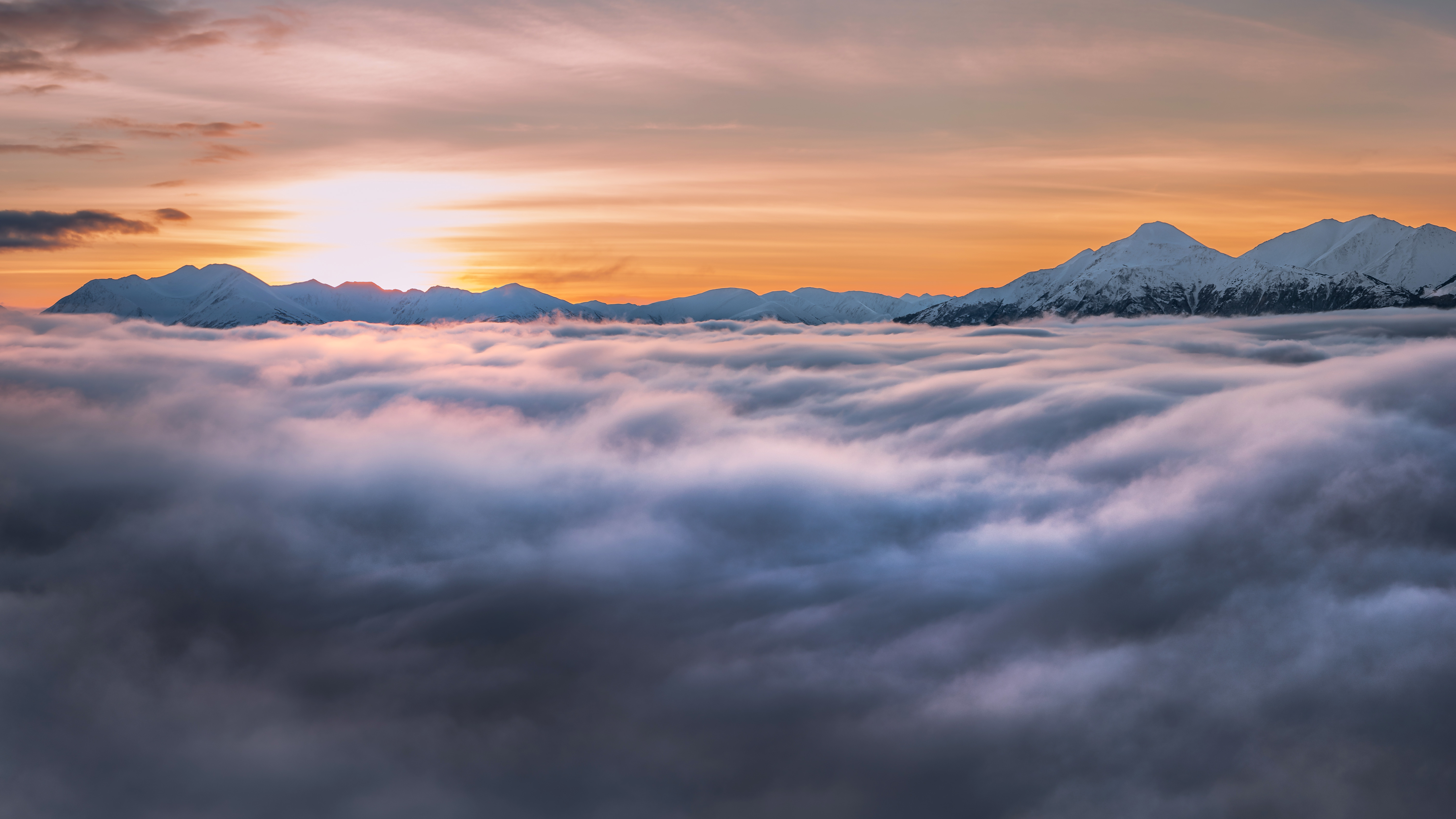 Sunrise over mountains above clouds at Turnagain Arm HD Wallpaper