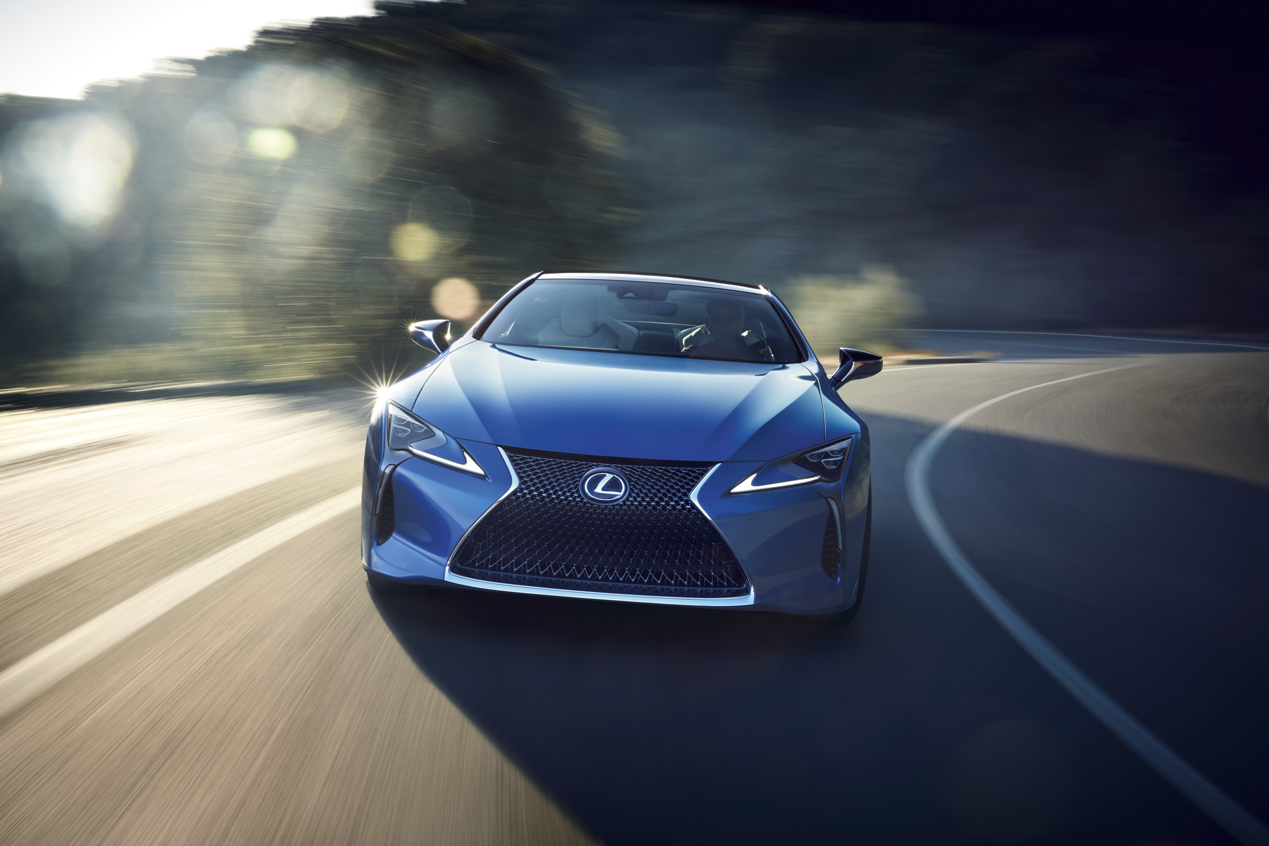 Blue Lexus LC 500h Coupe Driving on Road HD Wallpaper
