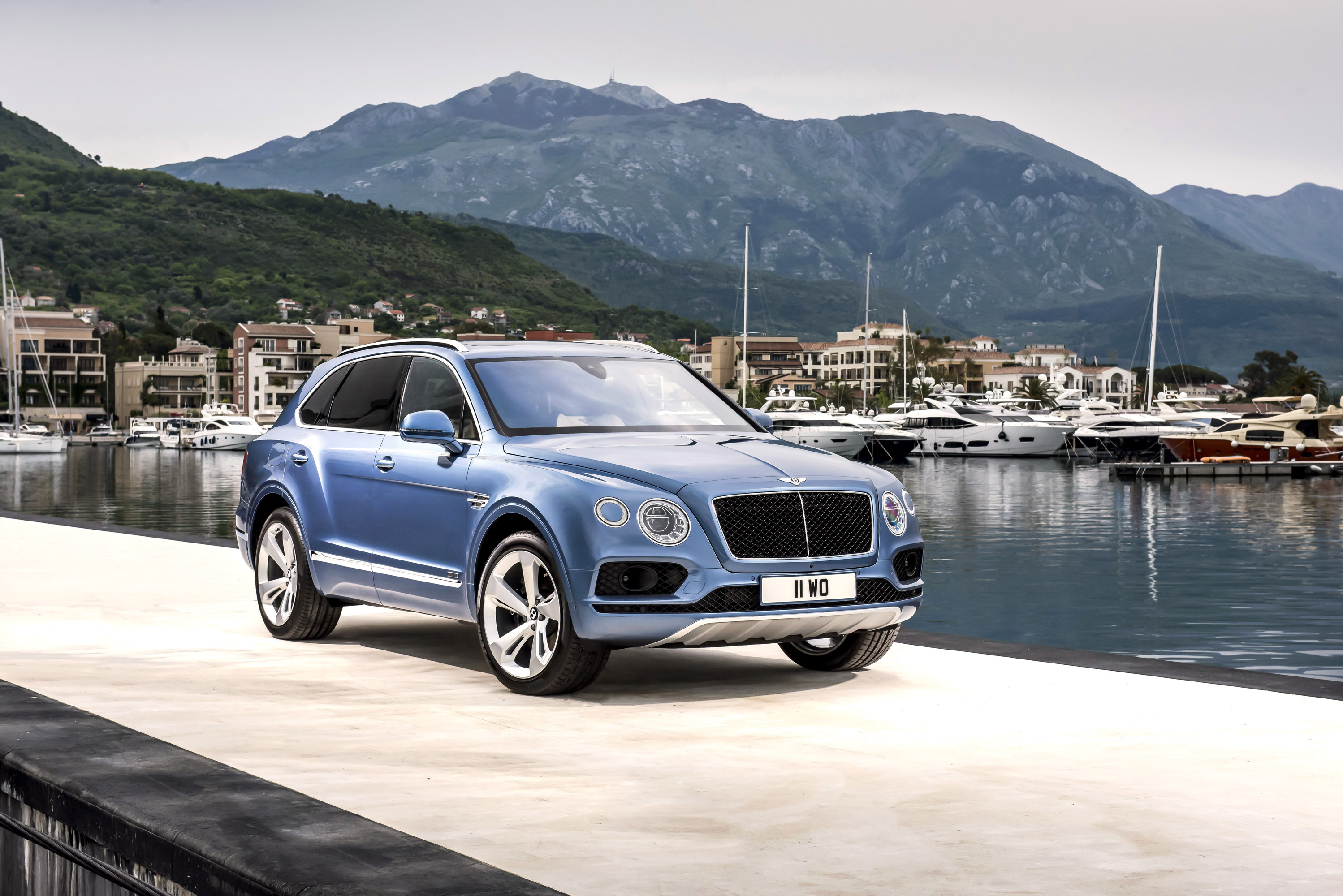 Bentley Bentayga Diesel SUV parked by a marina HD Wallpaper