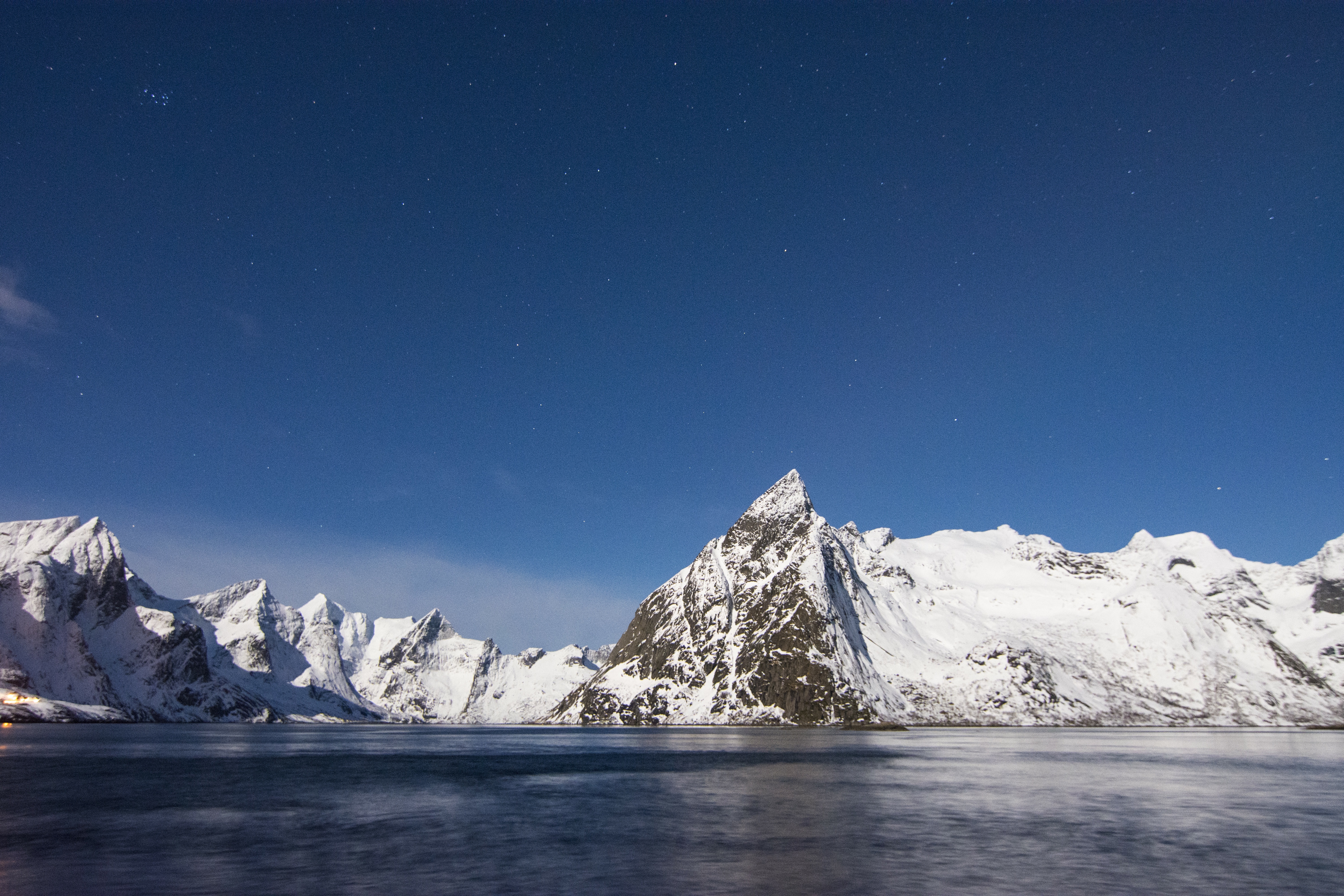 Snowy Mountains and Lake under Starry Sky in Norway HD Wallpaper