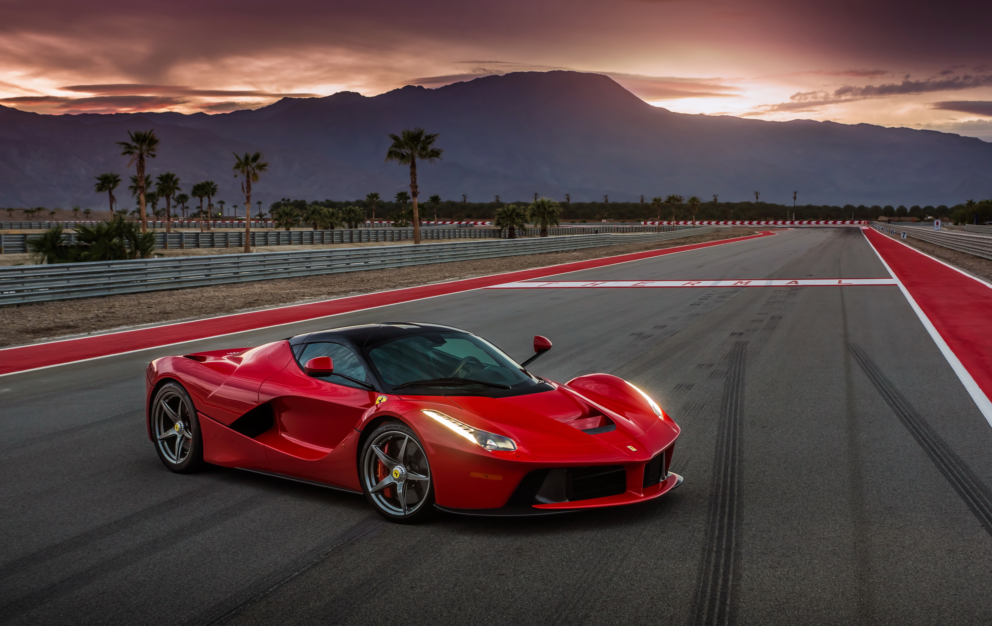Red Ferrari LaFerrari on a Race Track 4K HD Wallpaper