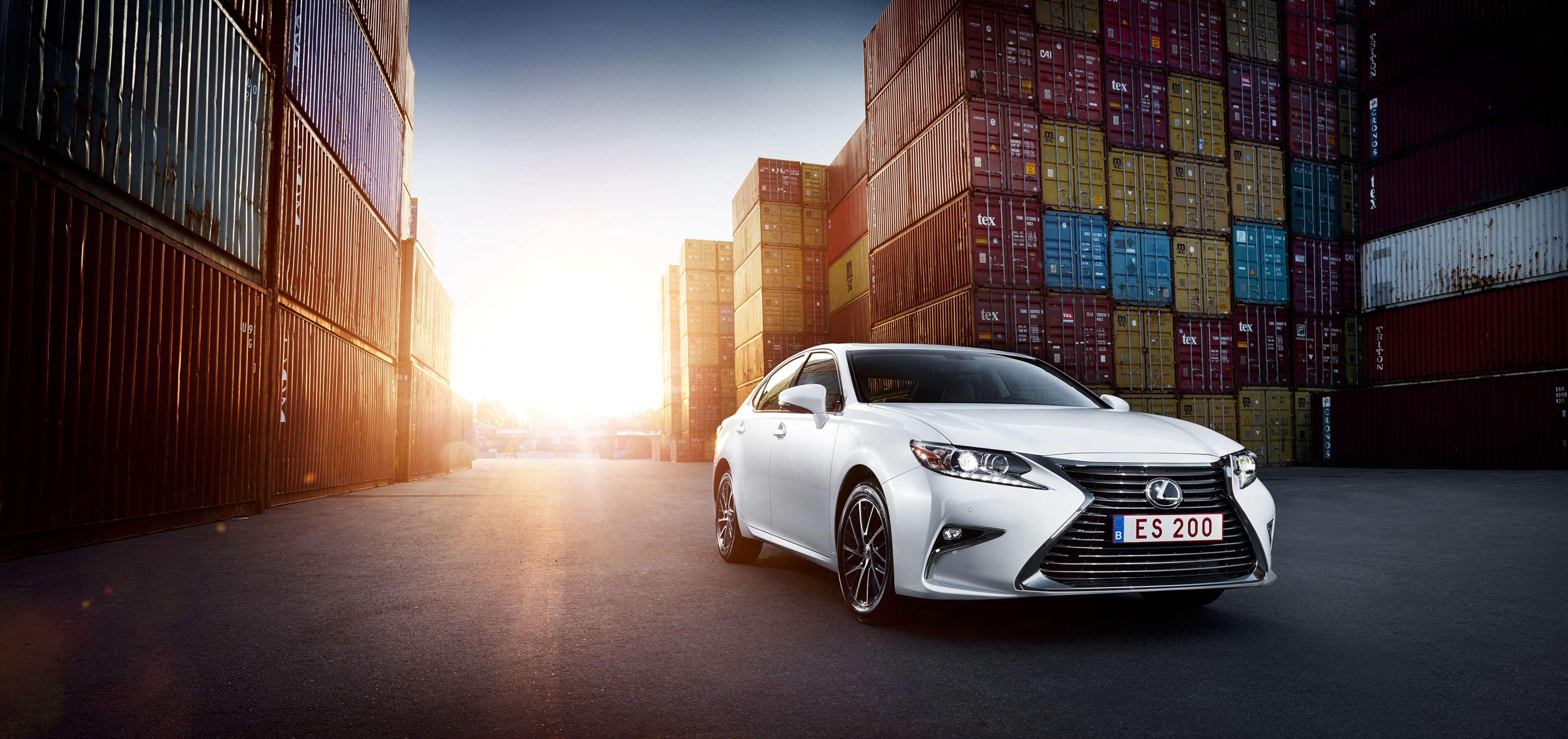 White Lexus ES 200 in shipping container yard HD Wallpaper